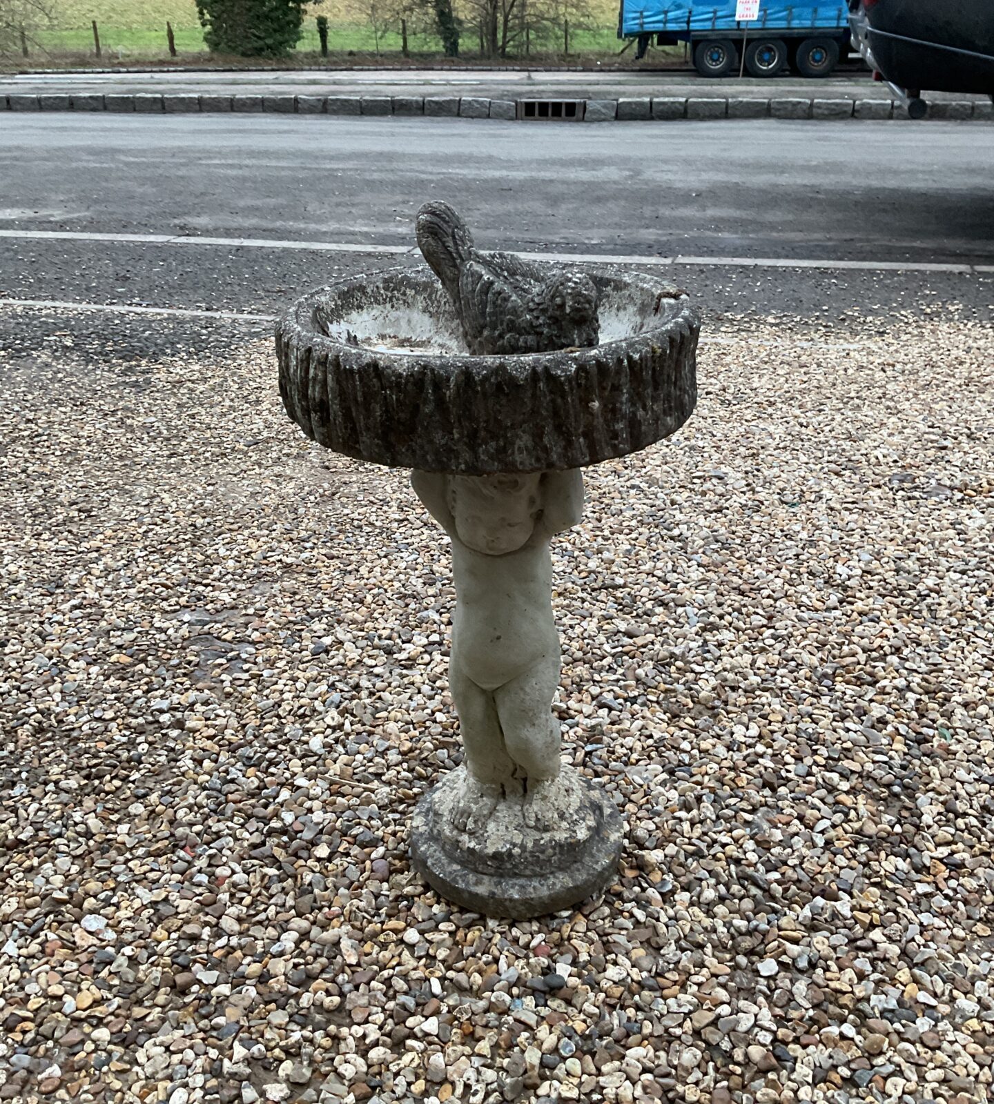 Small cherub bird bath