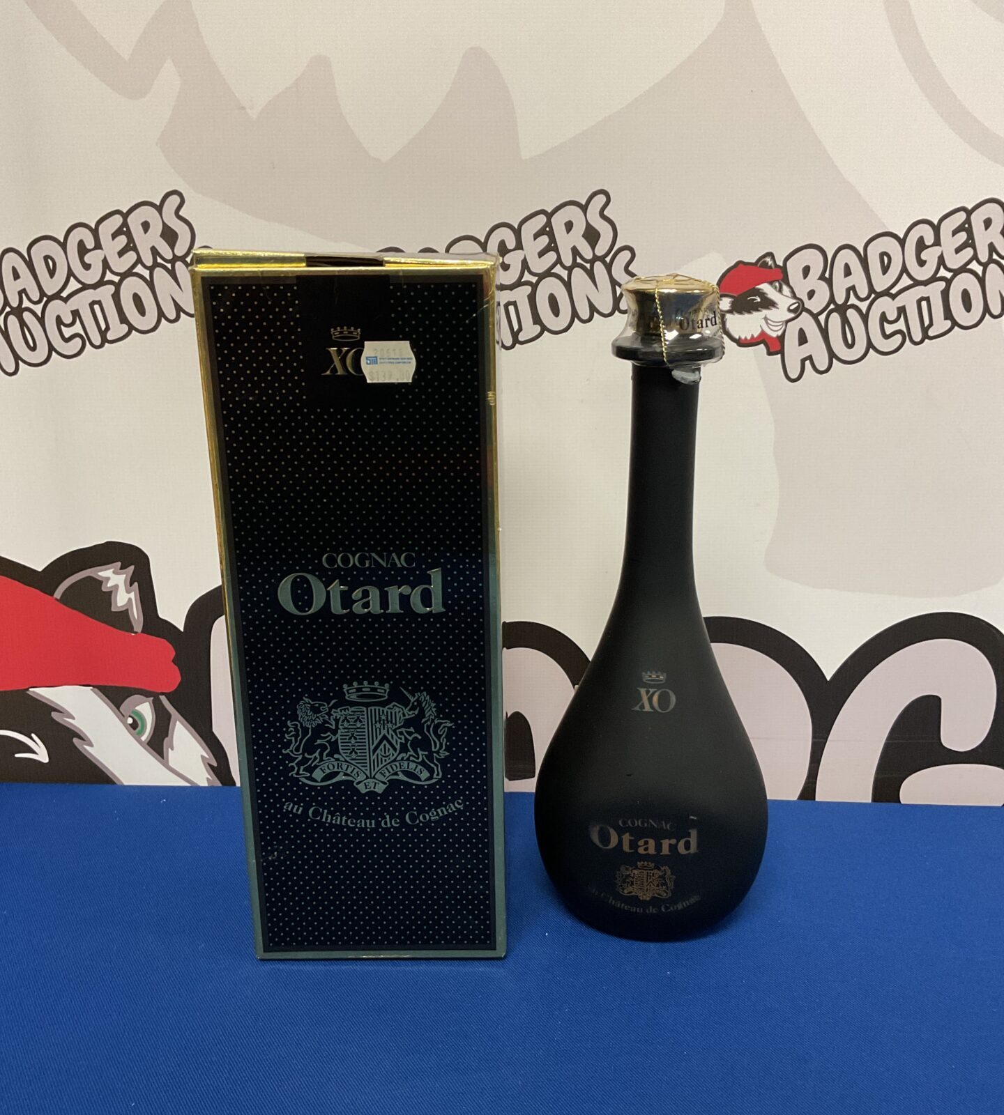 Sealed bottle of otard cognac xo