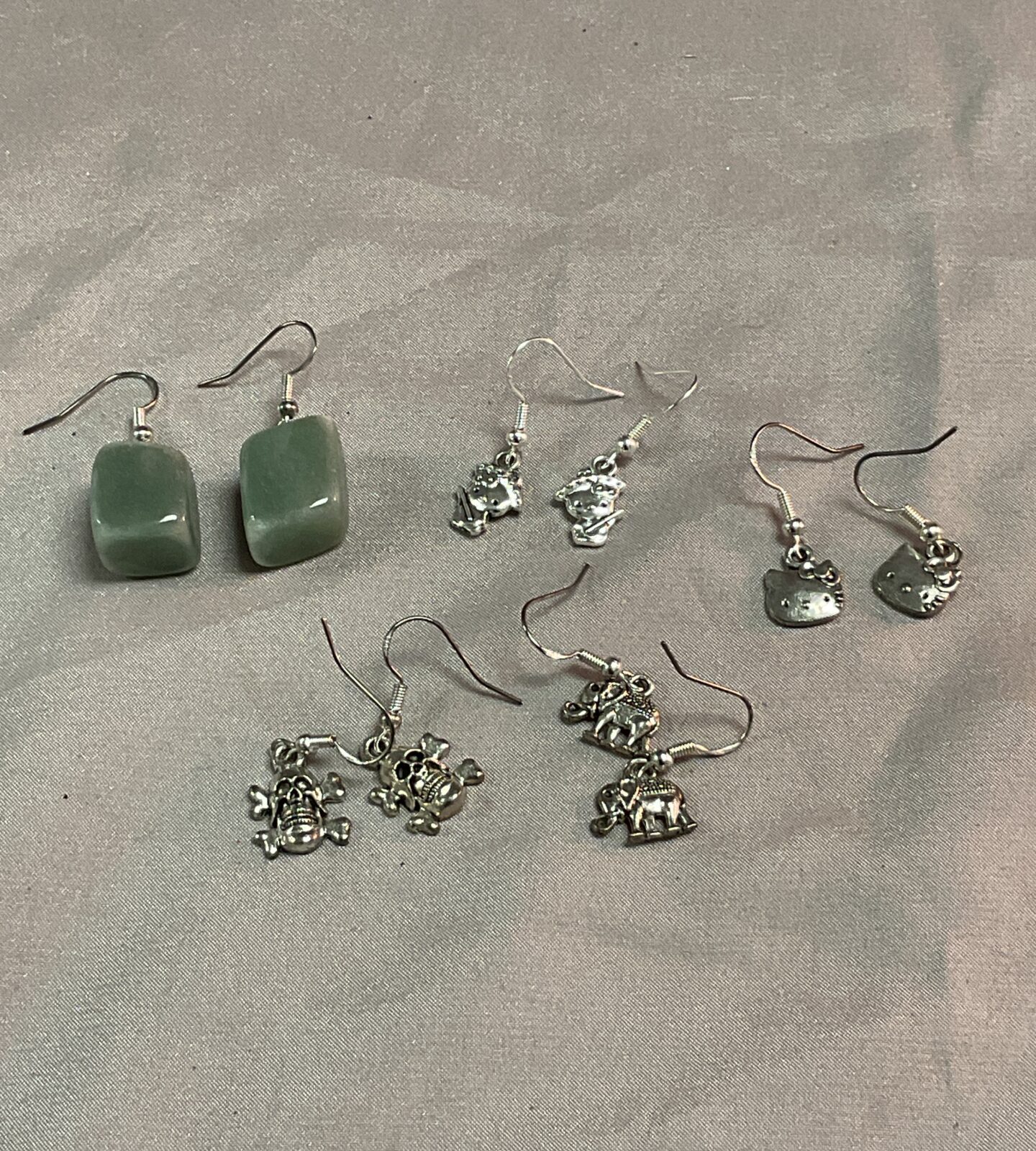 Five pairs silver earrings