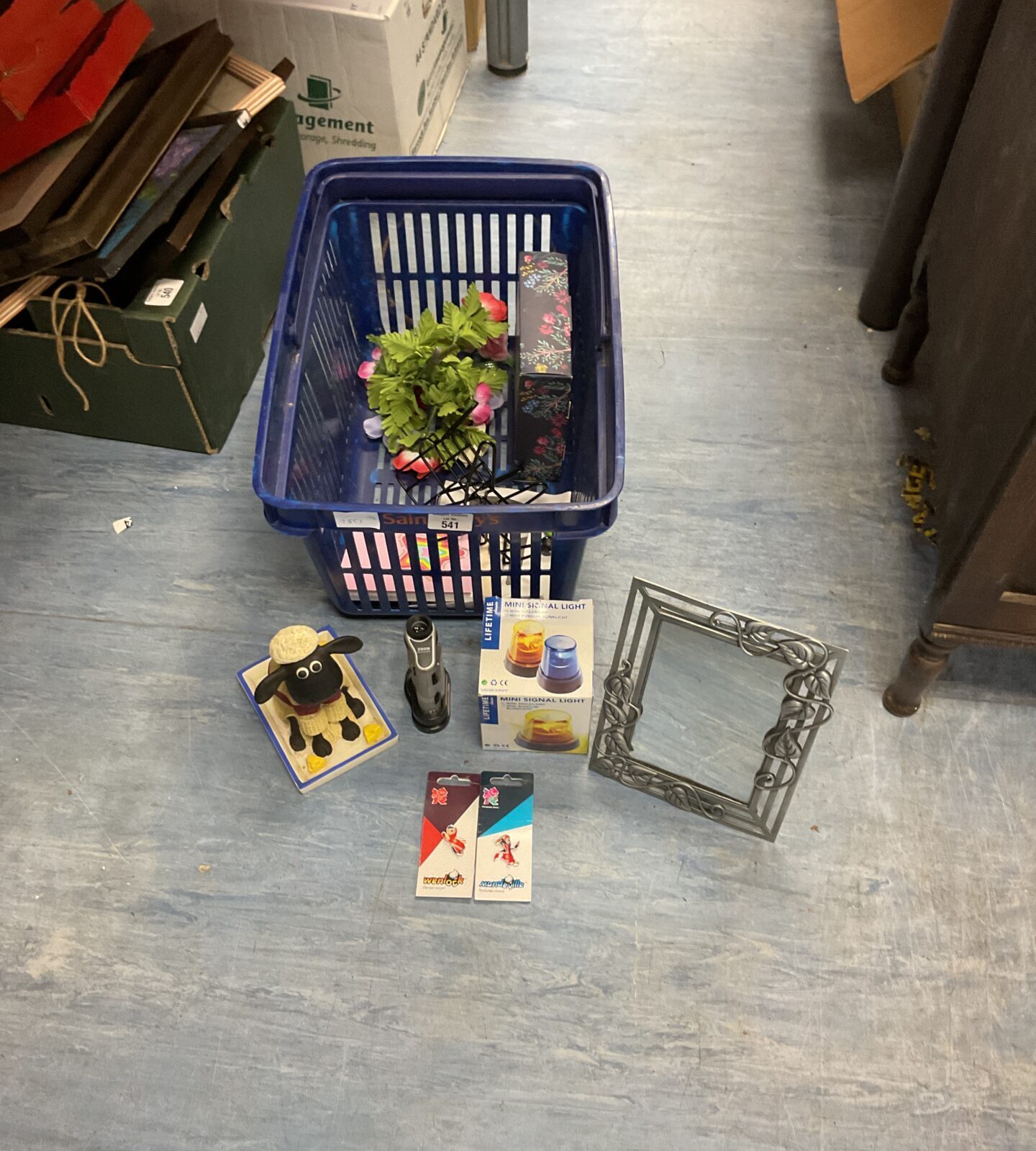 Crate of mixed inc mirror, shean the sheep bobble toy, national history museum mini microscope and siren light