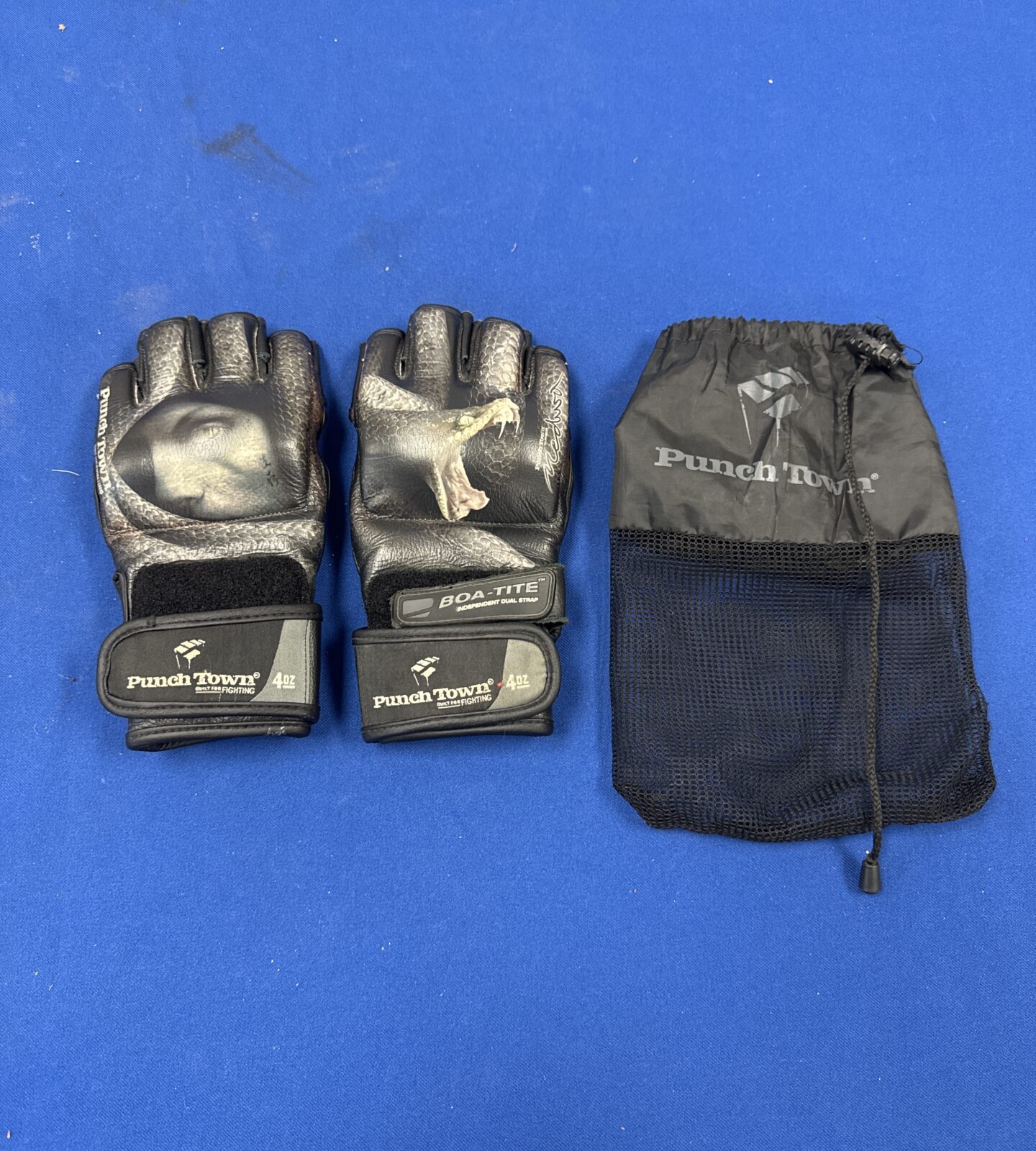 Pair of punchtown boa-tite martial arts 4oz gloves