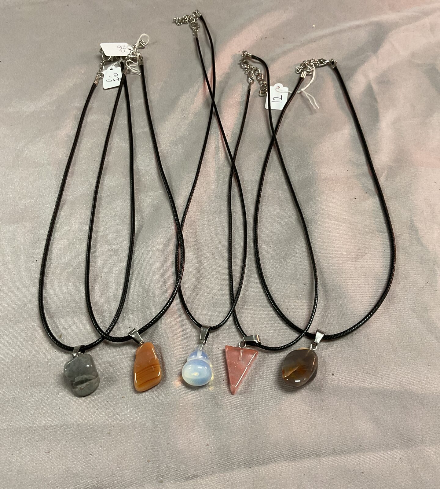 Five stone pendant necklaces