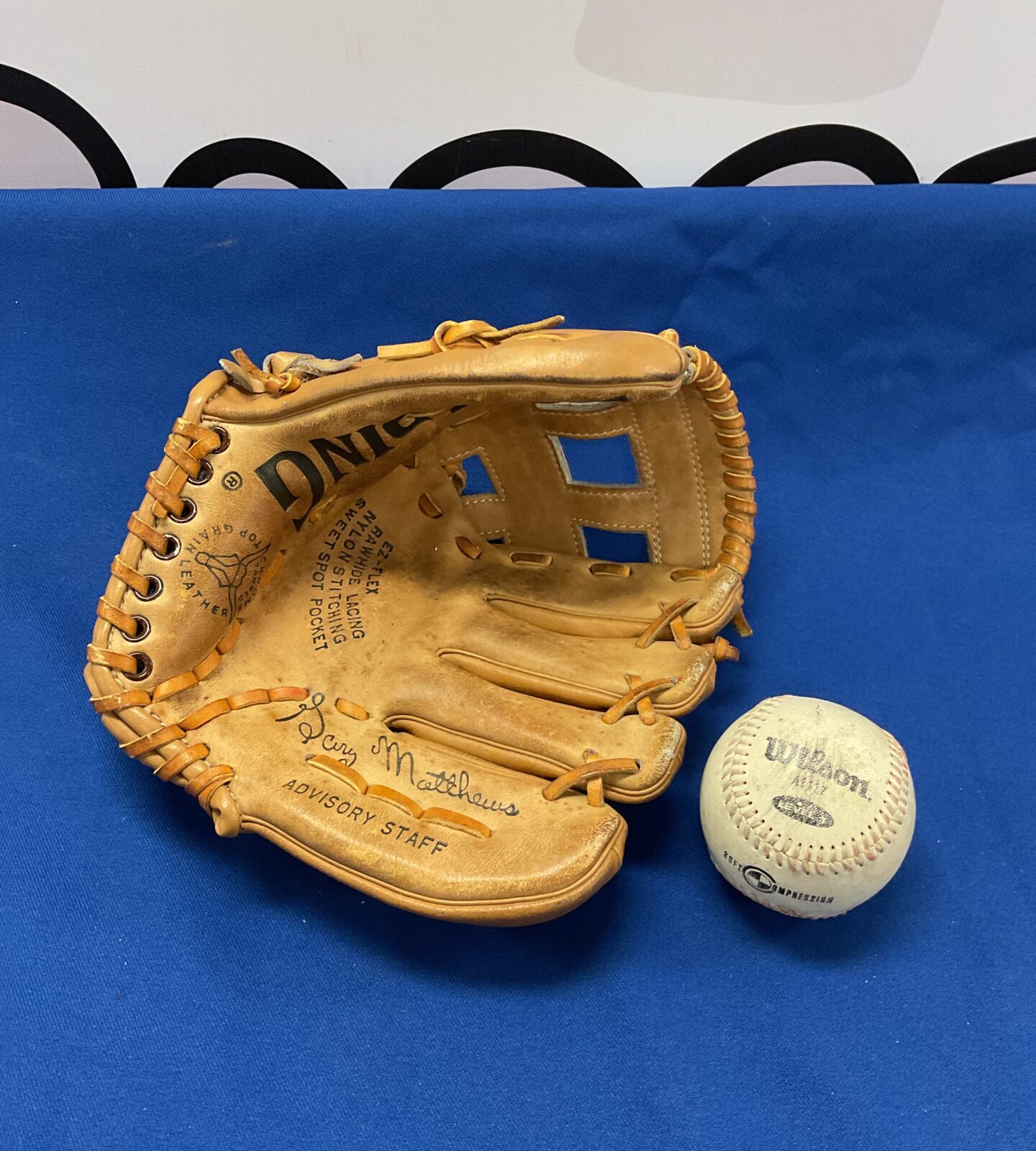 Spalding baseball mitt with wilson ball