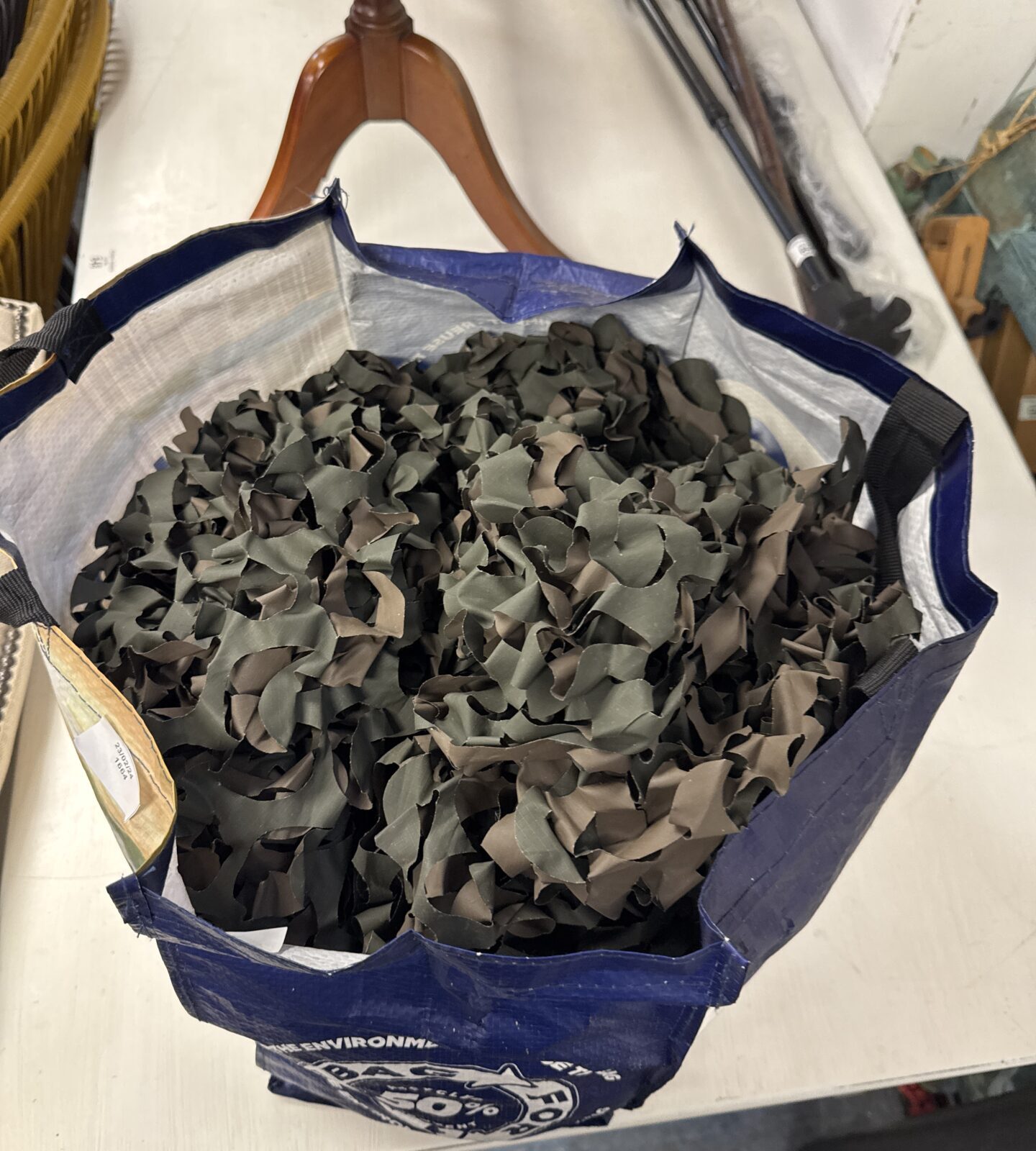 Bag of camouflage webbing