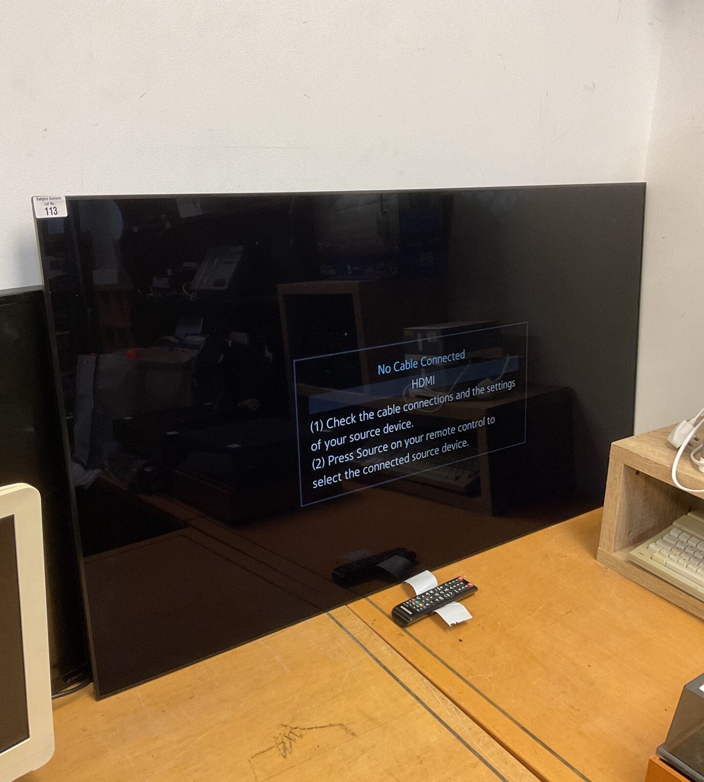 Samsung 55” hd tv with remote powers on untested further