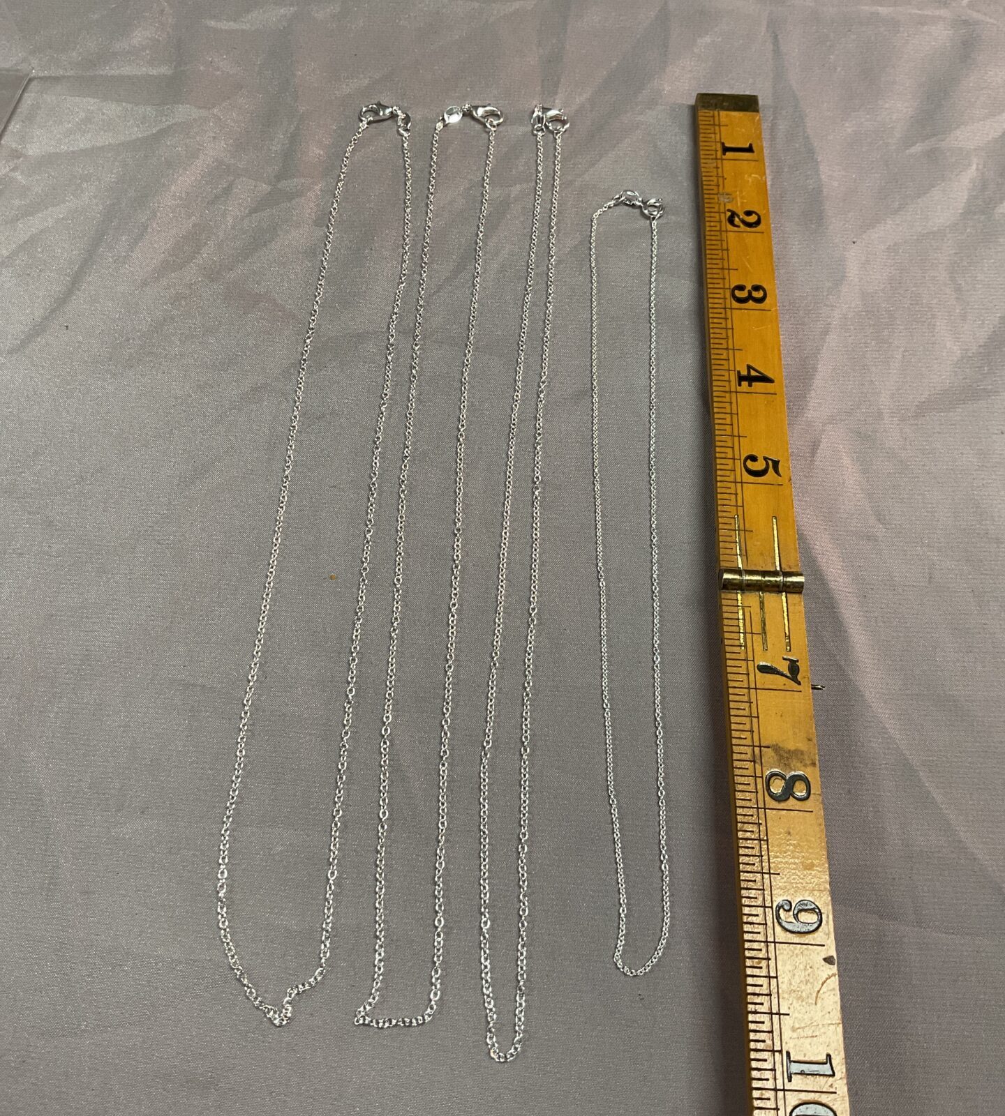 Four 925 silver necklaces