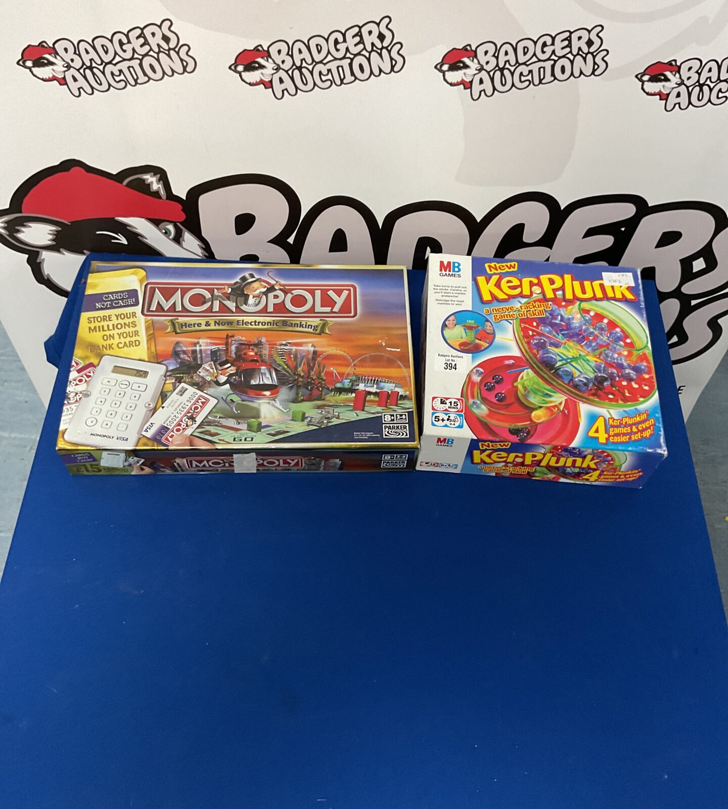 Two board games inc kerplunk and monopoly electronic banking