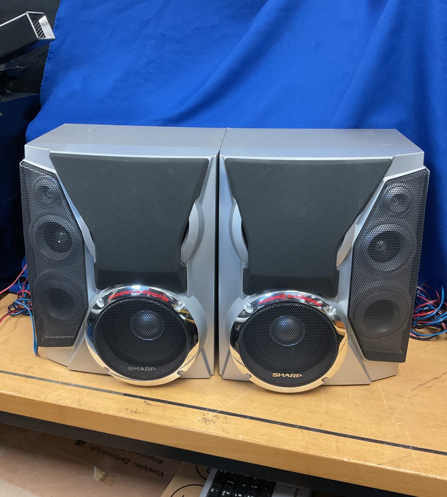 Pair of sharp powered subwoofer speakers
