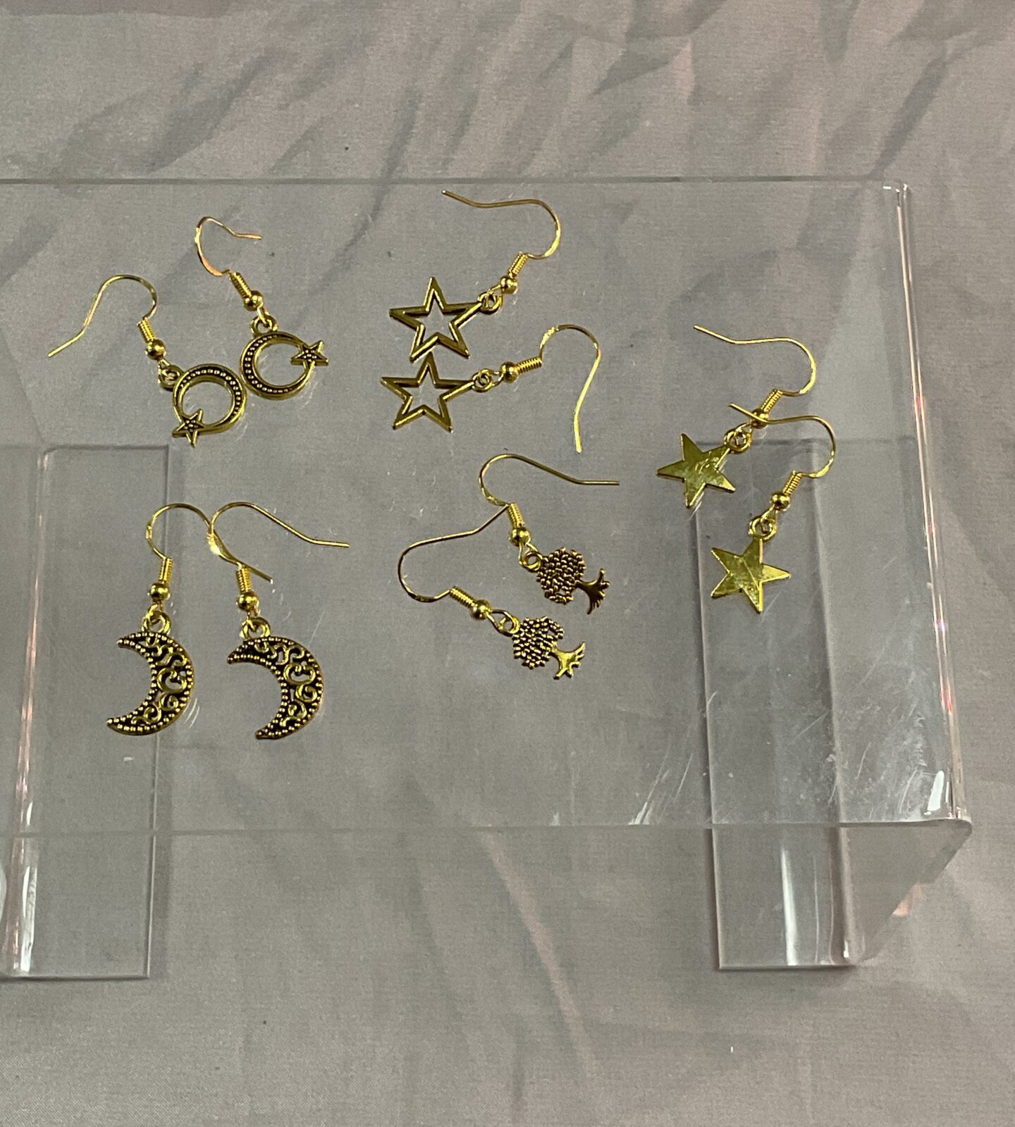 Five pairs silver gilt earrings