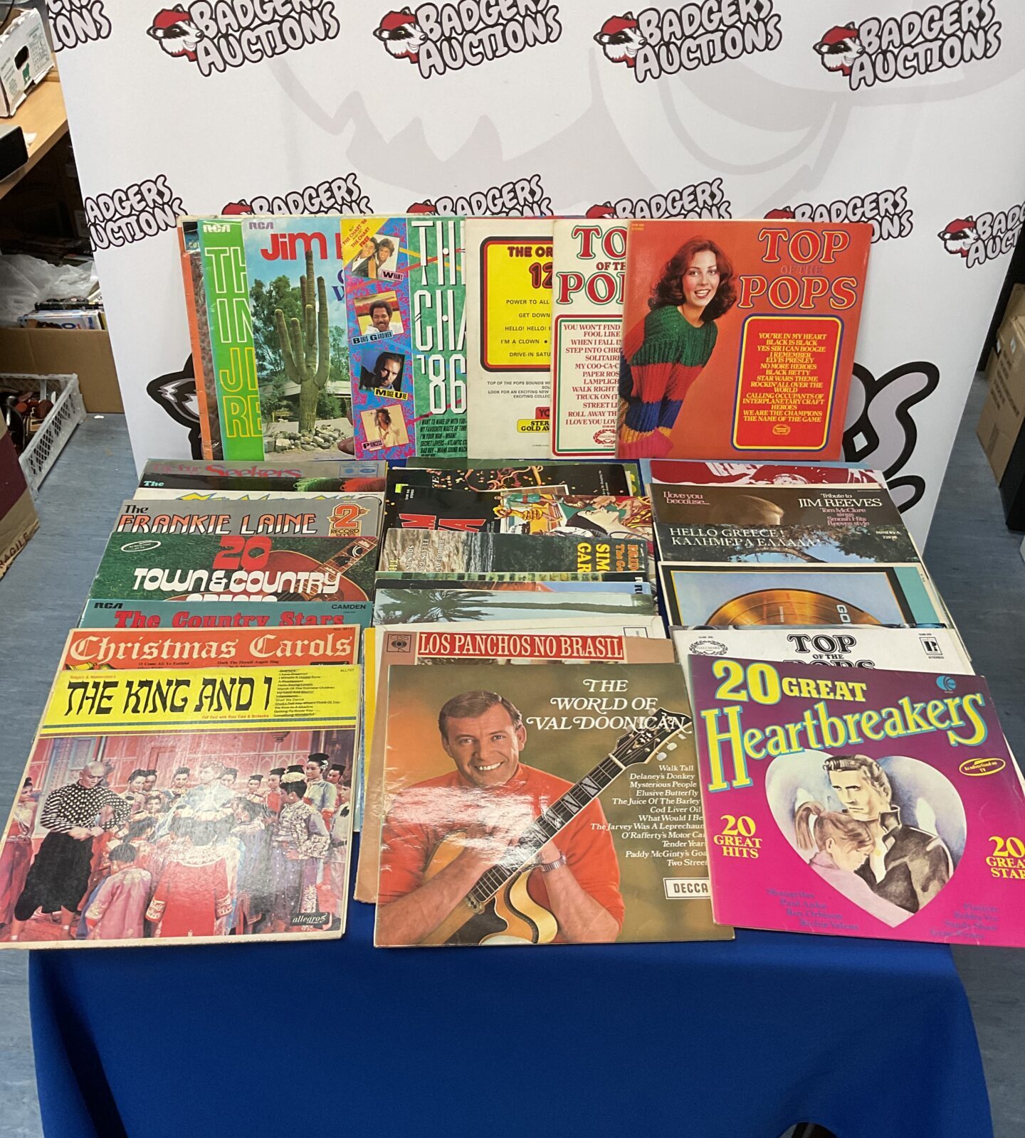 Collection of 12” vinyl records including top of the pops