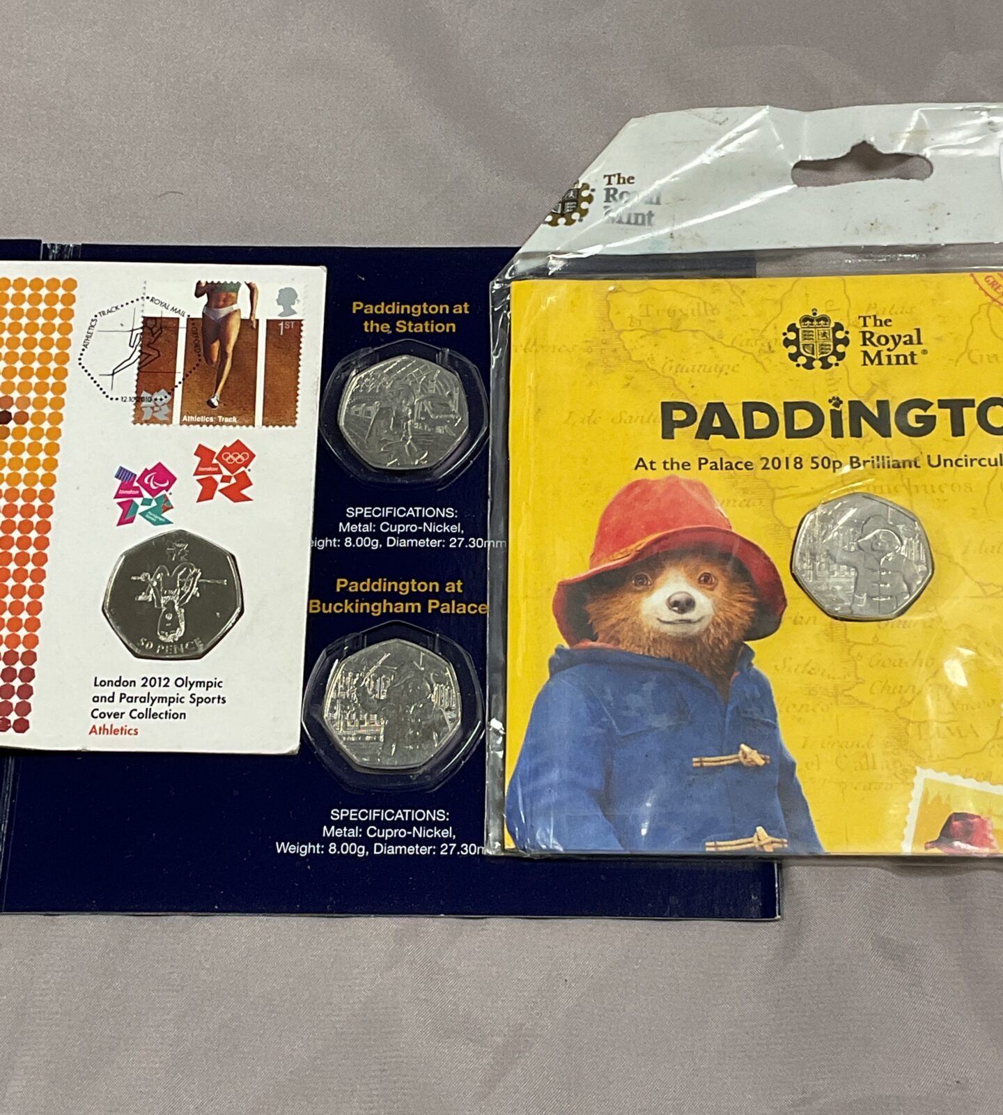 four 50p uncirculated  coins inc  paddington