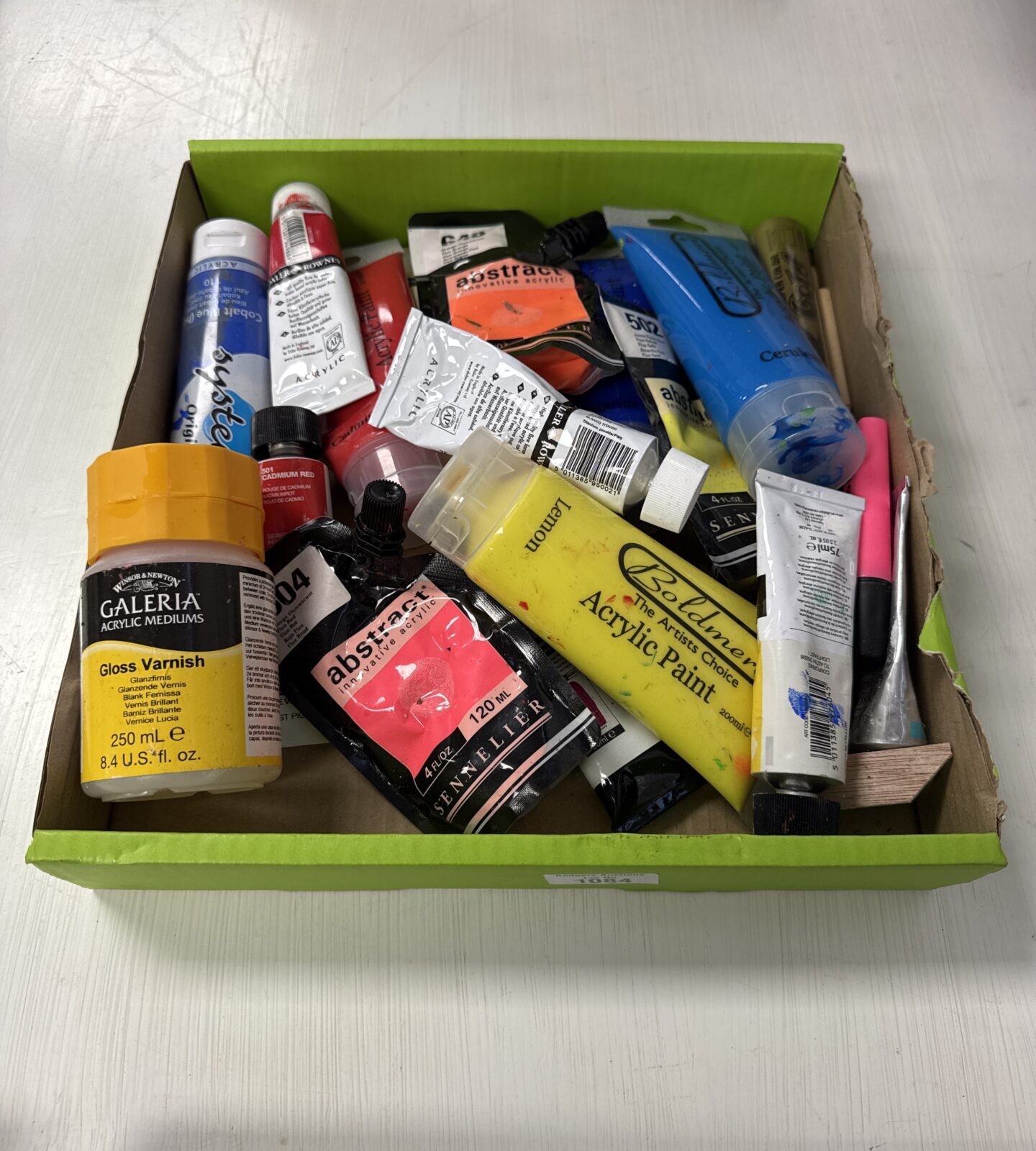 Small tray of part used acrylic paints