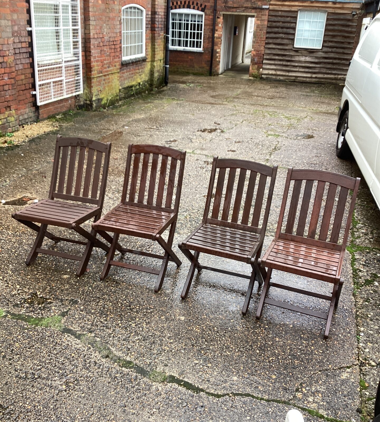 Four Teak Garden Folding Chairs