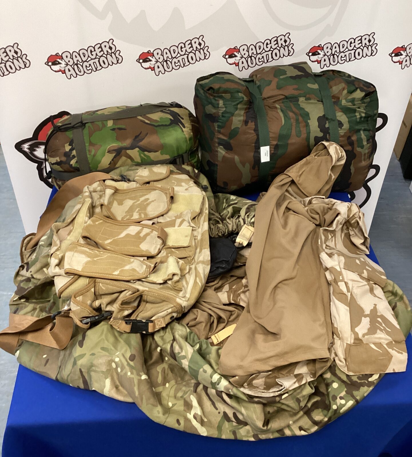 Two british forest army camouflage sleeping bags inc hi-gear & bag of british military supplies inc bags, pouches & clothing