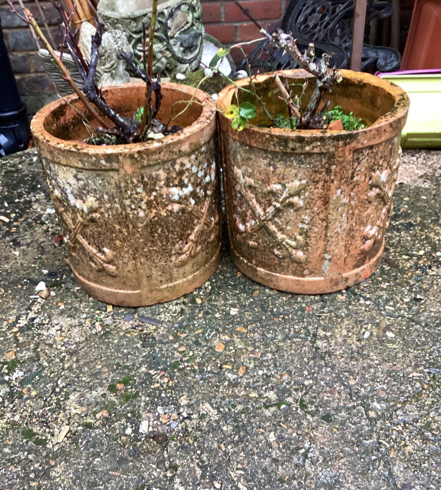 Two stone effect garden planters