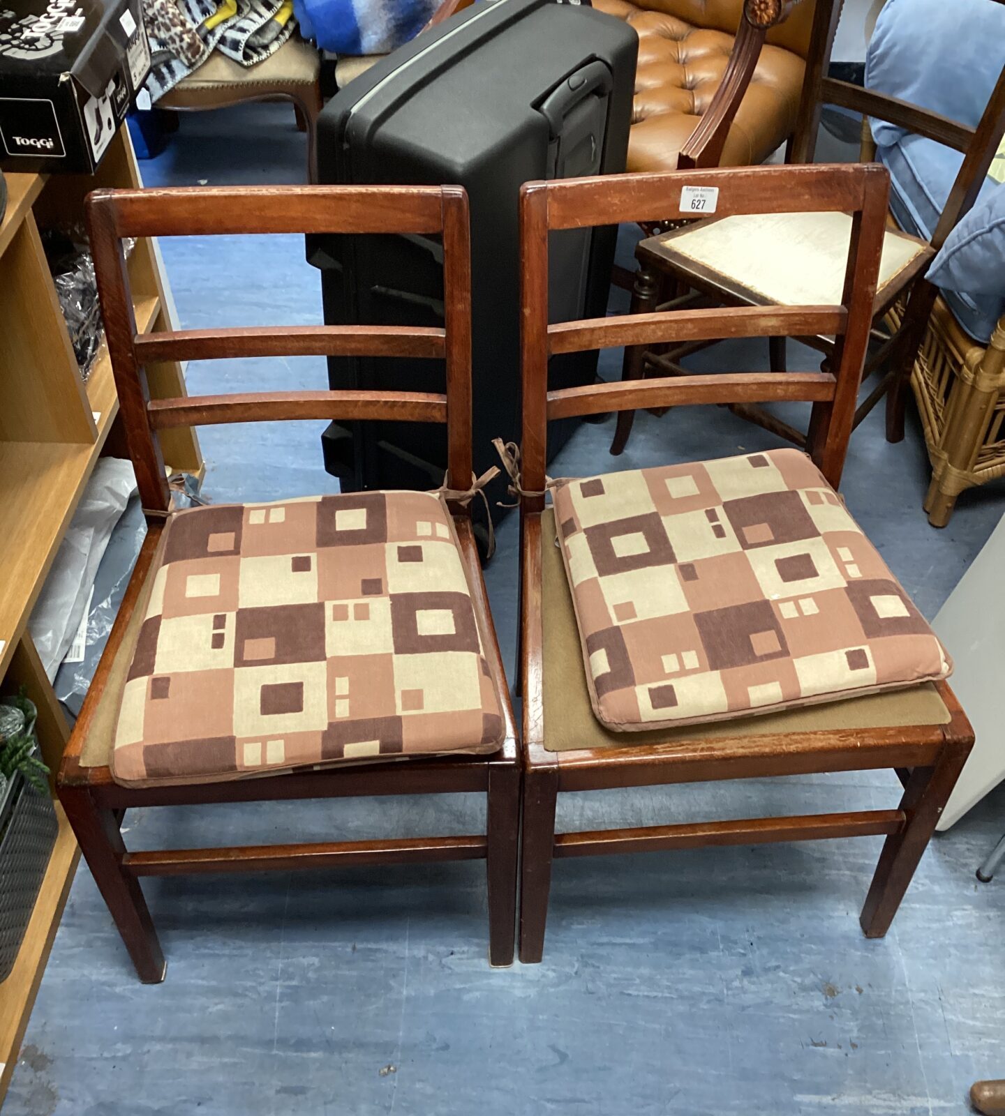 Two vintage stick back dining chairs