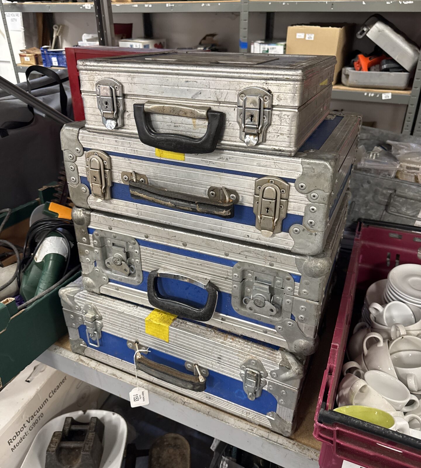 Four ABS London flight cases - largest at bottom 19.75” length