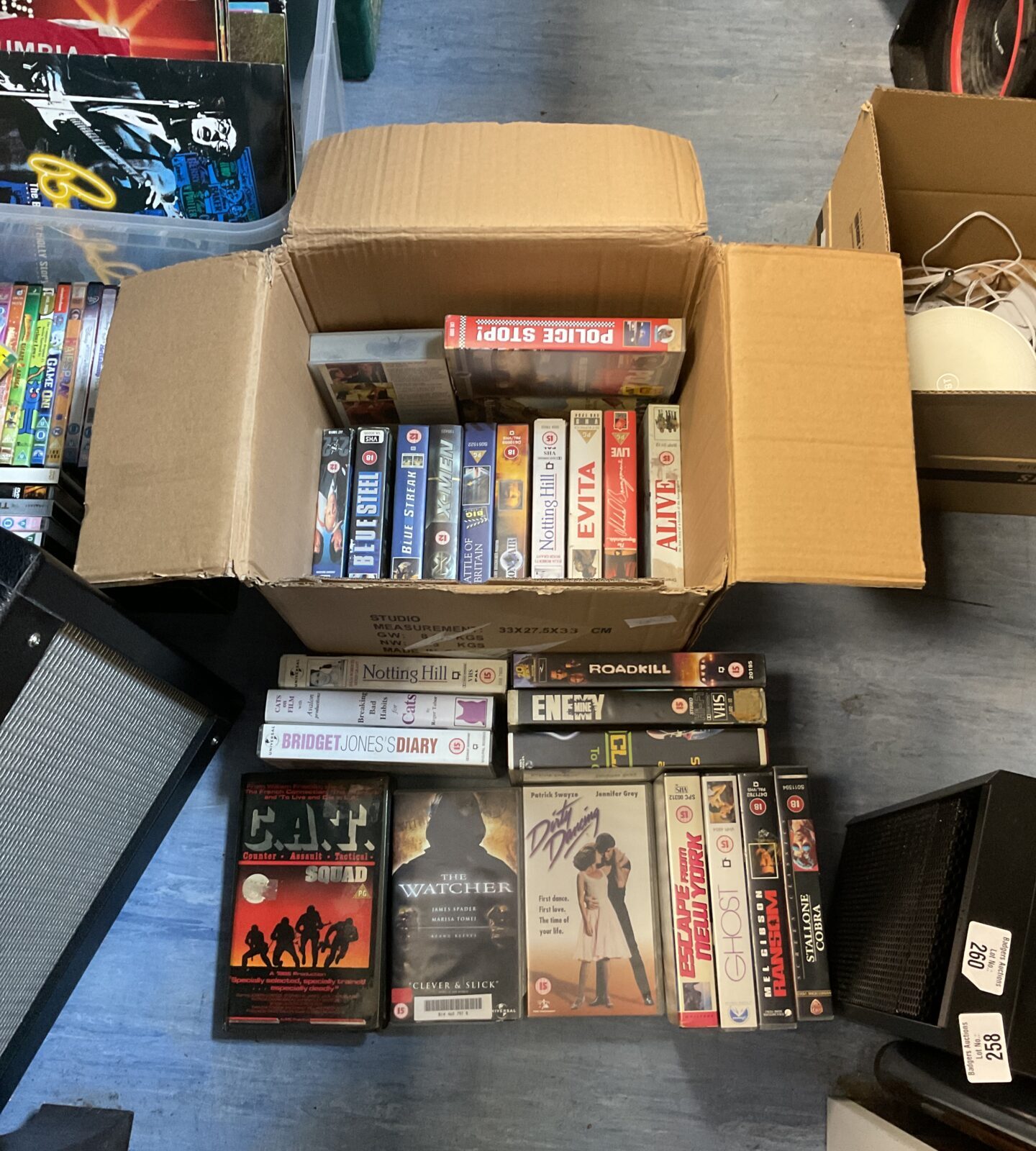 Box of vhs movie cassette tapes