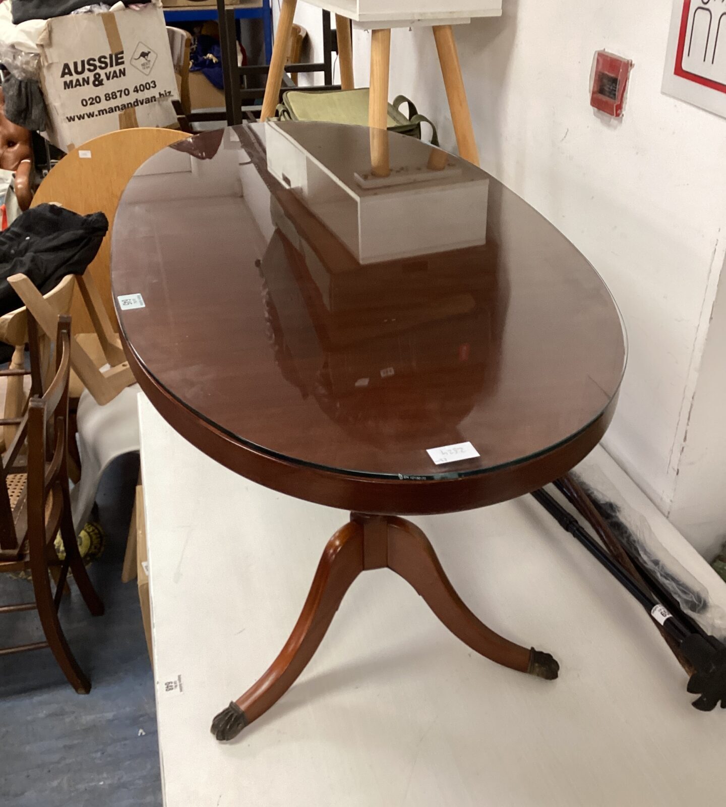 glass topped Claw footed oval regency style coffee table