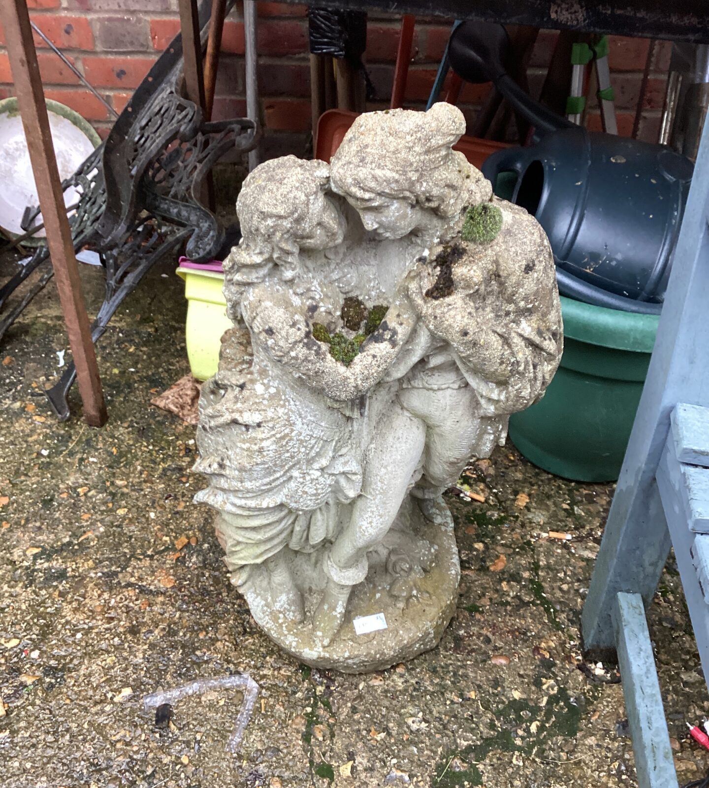 Garden Statue of figures hugging