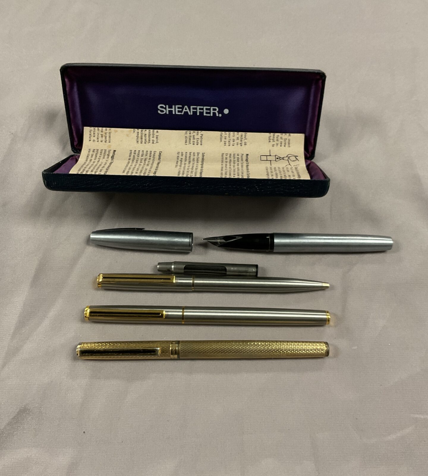 Sheaffer fountain pen and three messenger pens