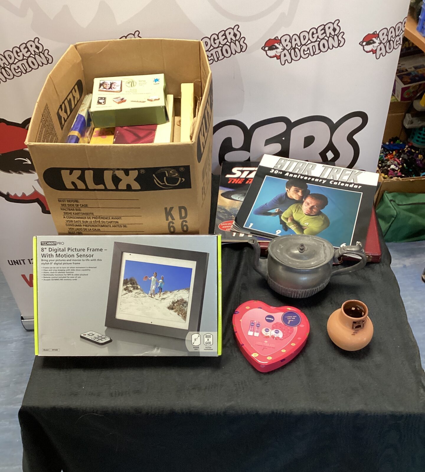 Box of house clearance inc 8” digital picture frame, pewter teapot & quantity of 78s