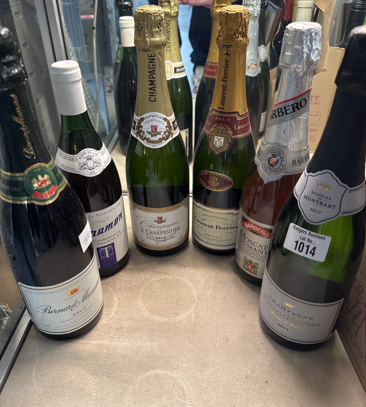 Six bottles of alcohol inc Laurent Perrier champagne