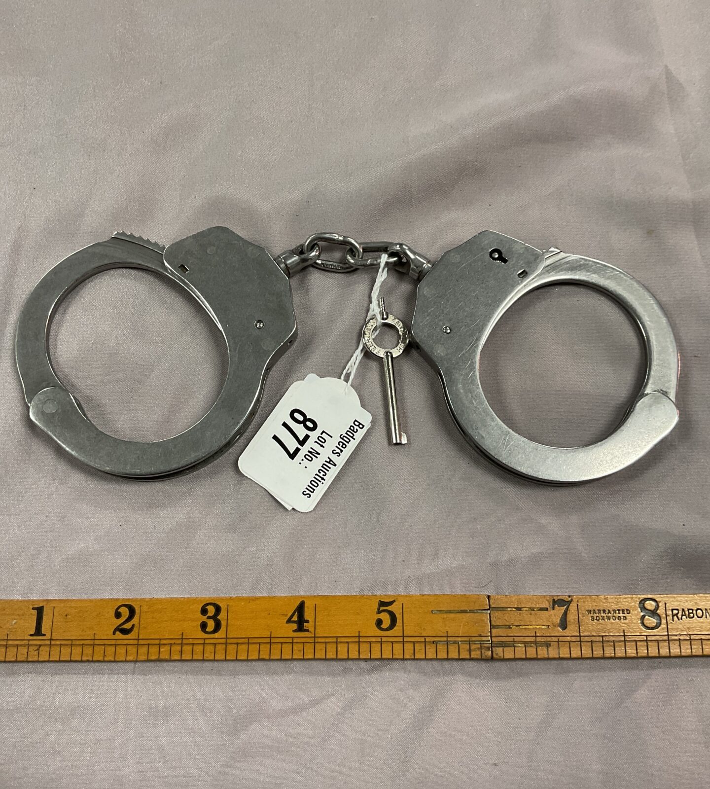 Pair of handcuffs with key