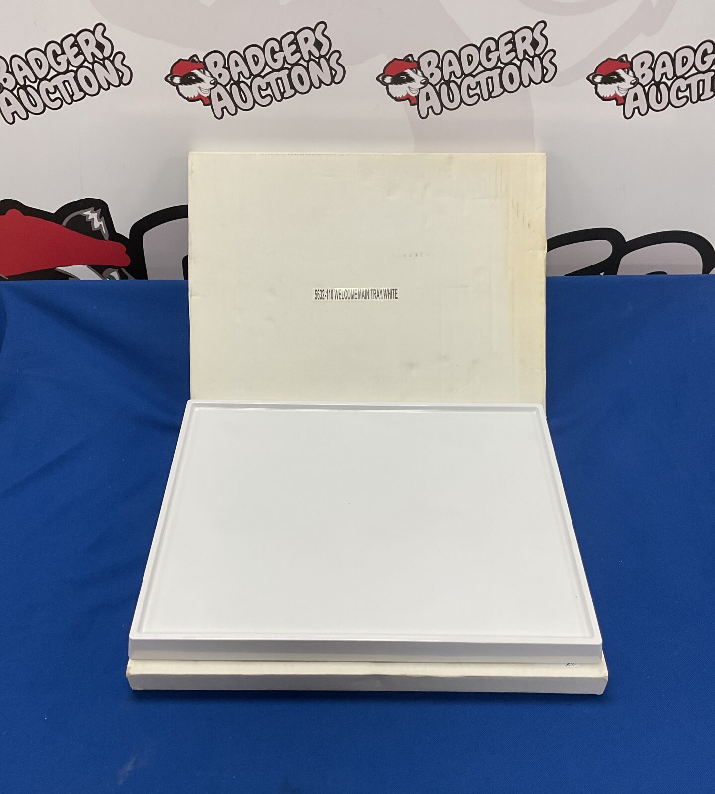 Two new White plastic welcome display trays