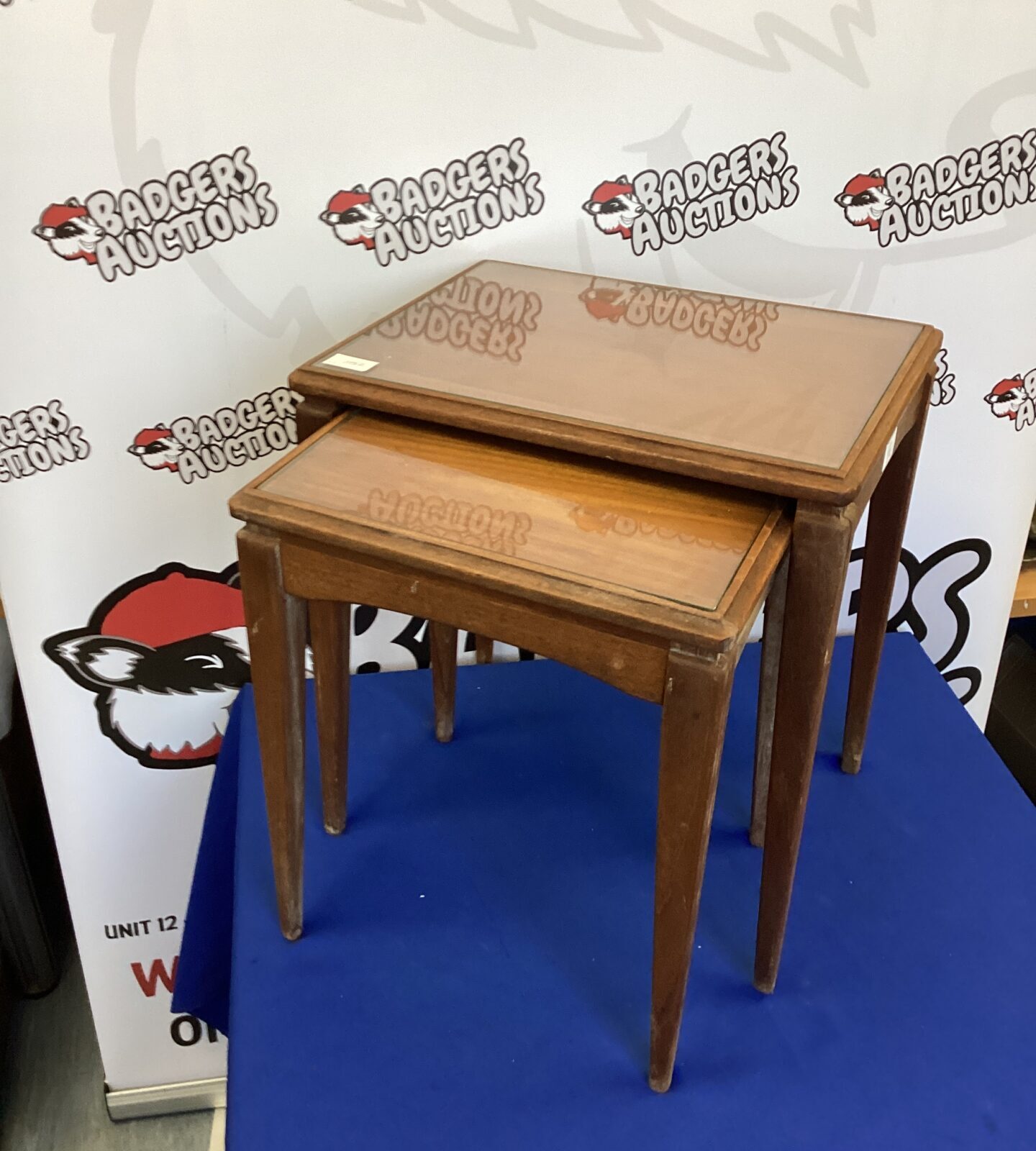 nest of Glass topped teak Tables