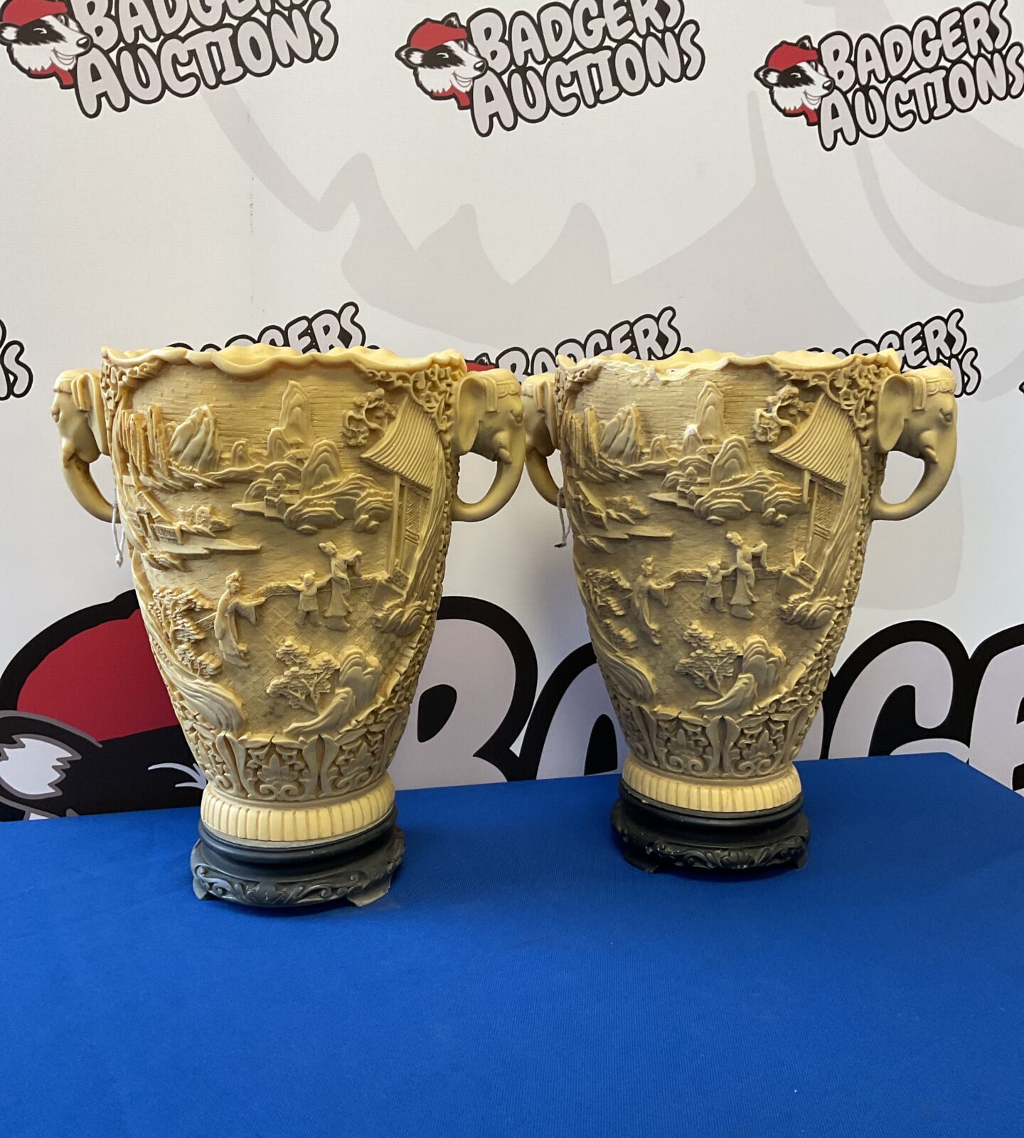 Pair of decorative chinese urns with elephant head handles