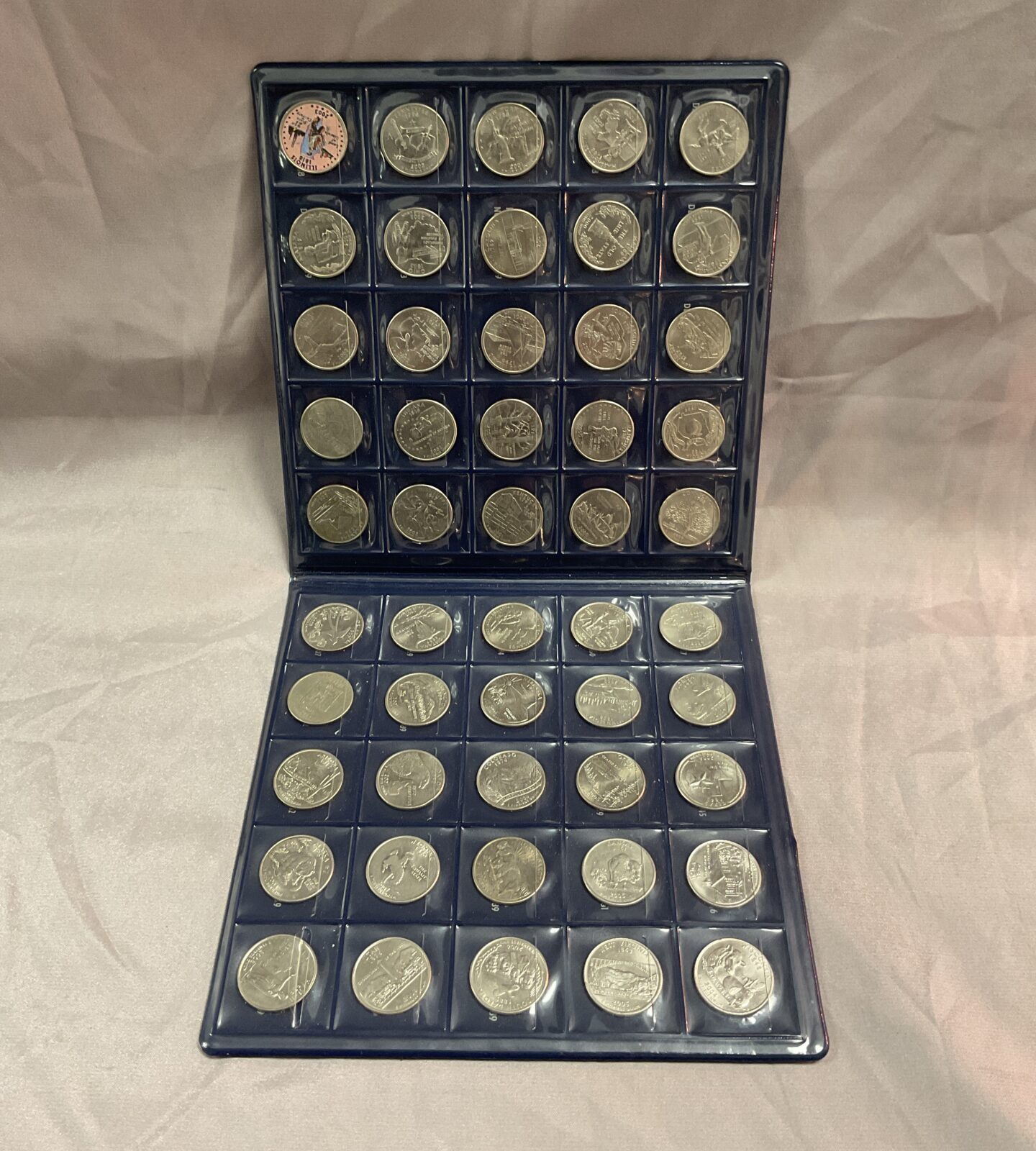 folder of 50 States of the Union American  25 cent coins