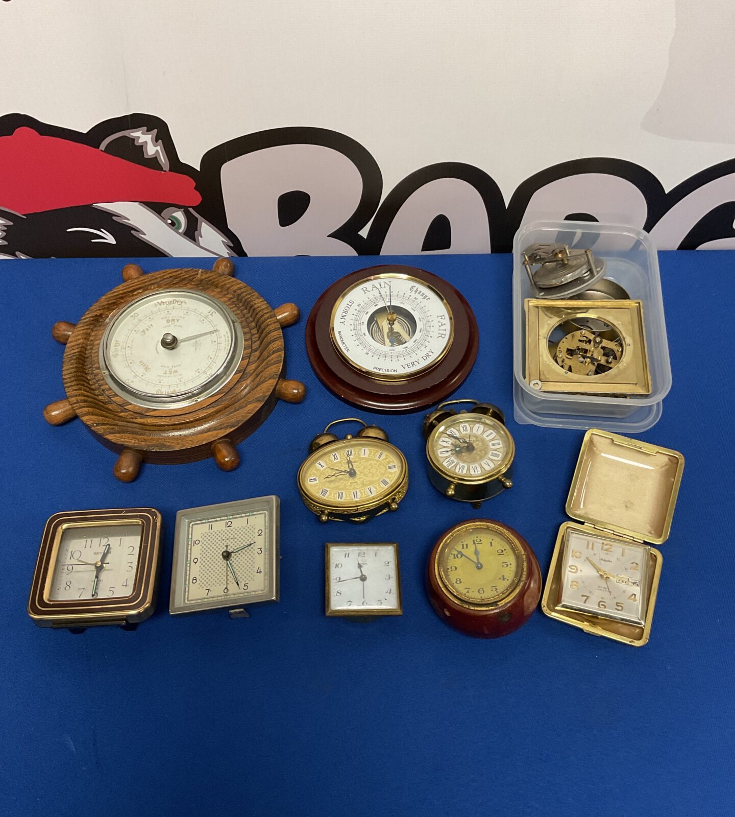 Box of vintage travel clocks & barometers