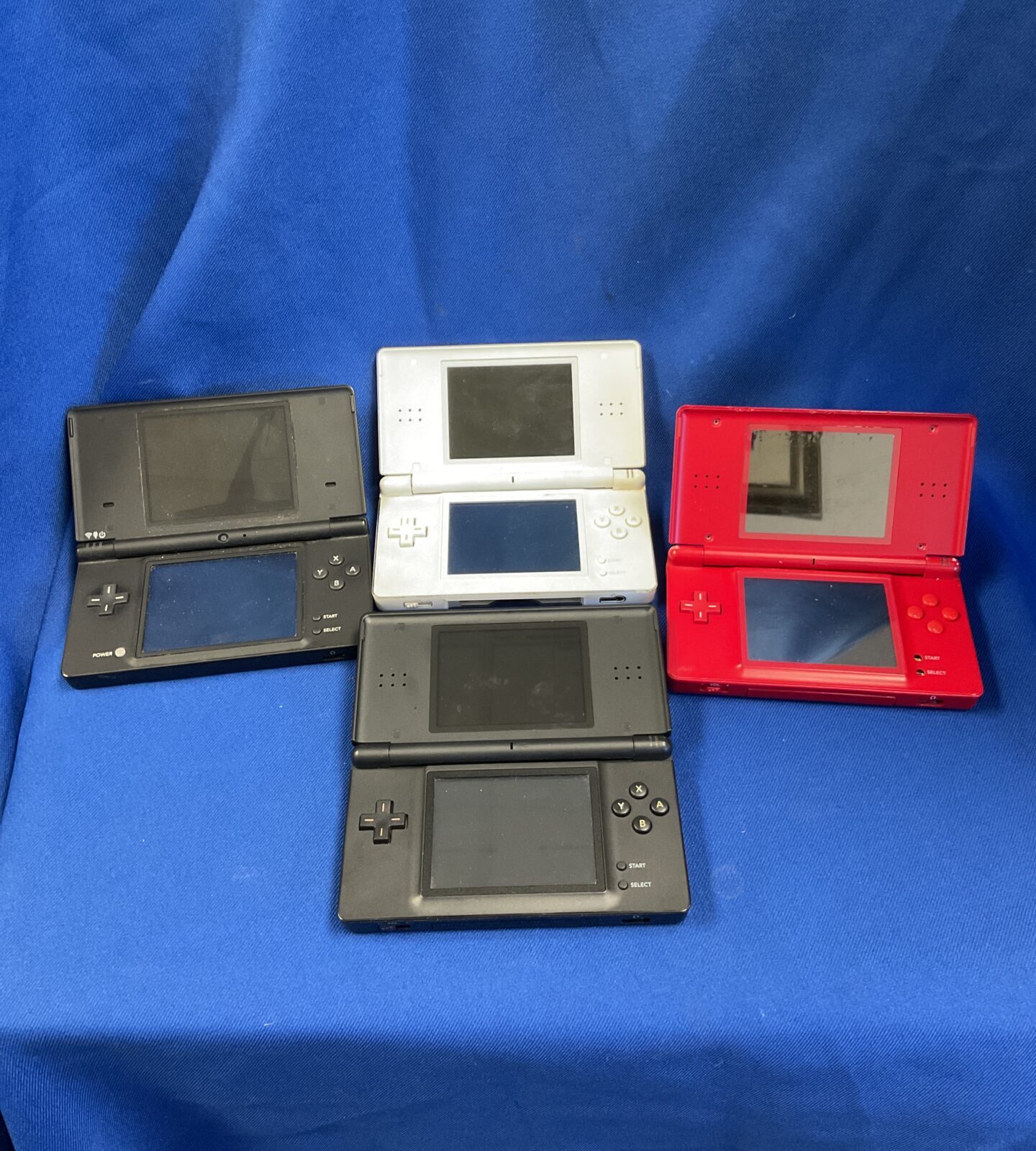 Four nintendo ds lite consoles for repair