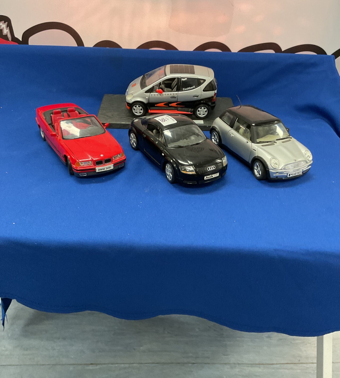 Four diecast models inc solido, revell and maisto