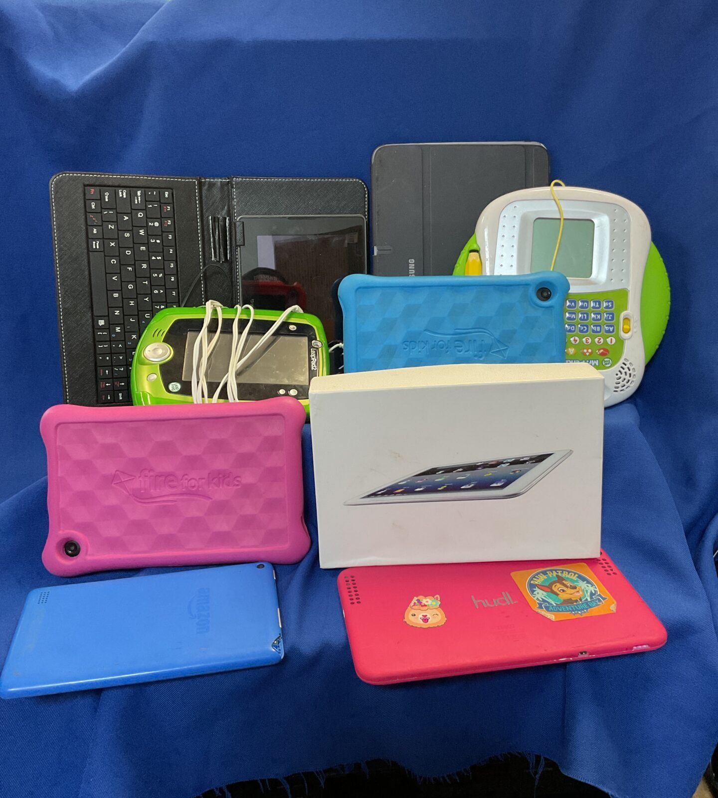 Box of tablet computers including samsung galaxy & amazon fire