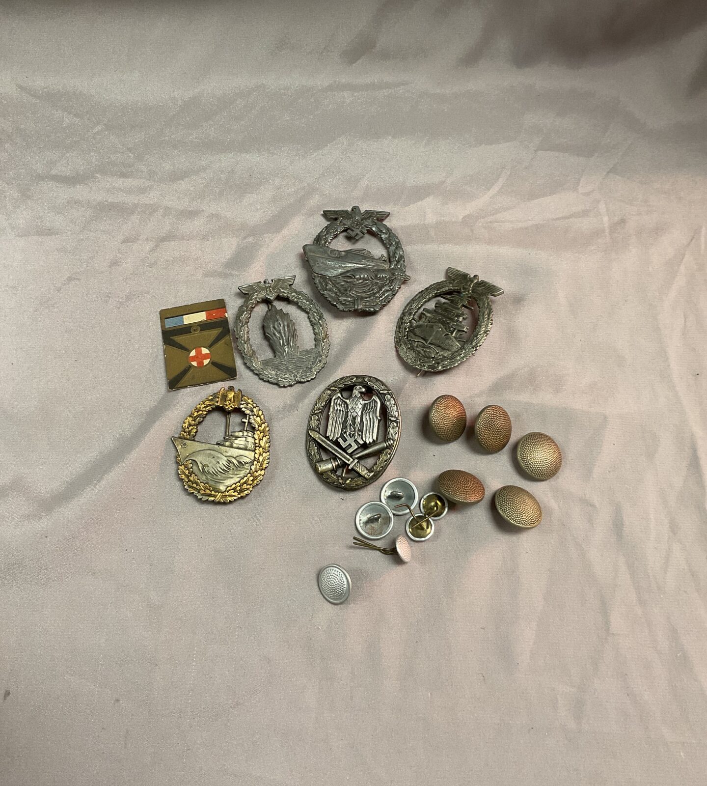 Four ww2 German replica badges and buttons