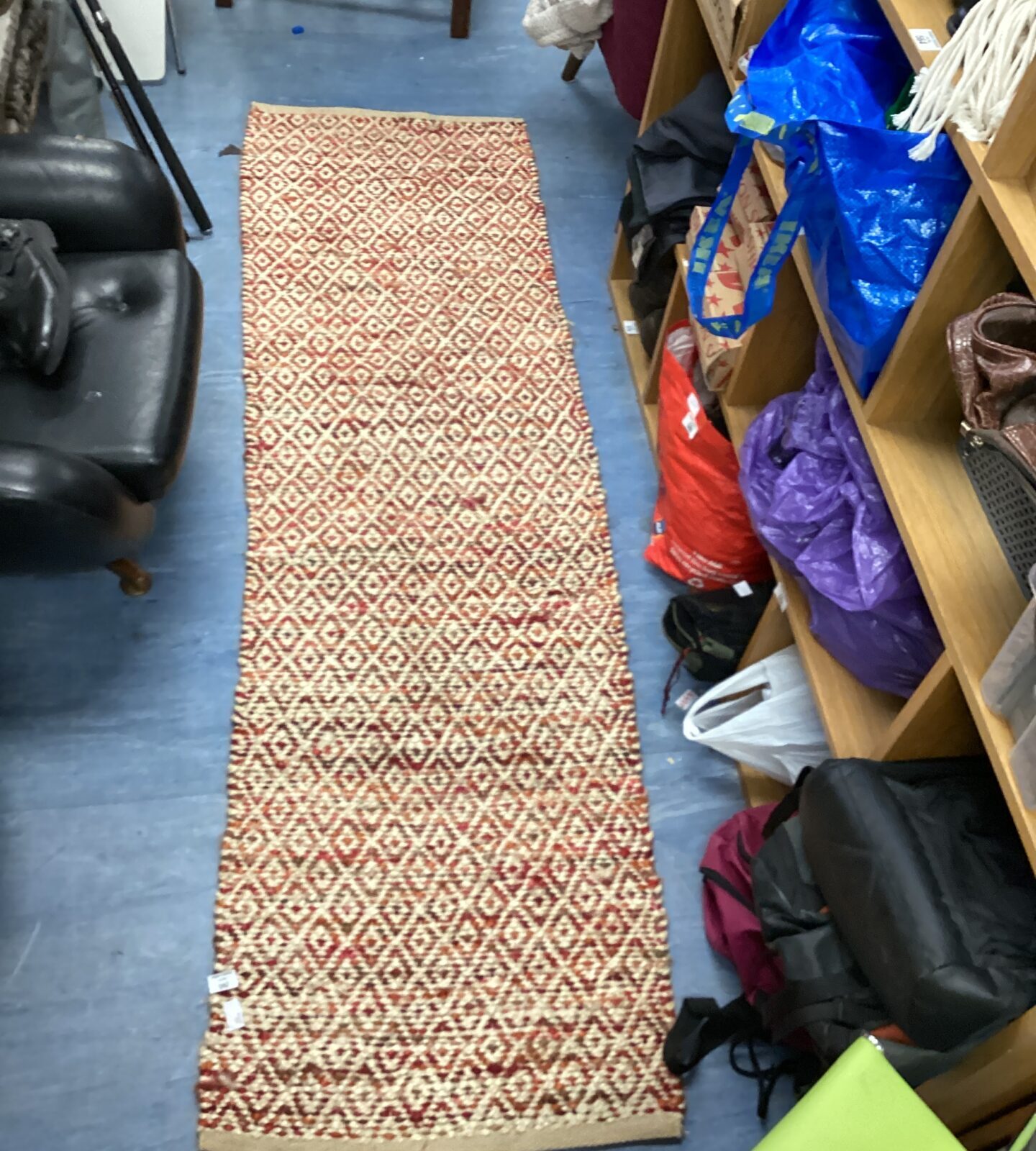 Woven cream, orange & red rug