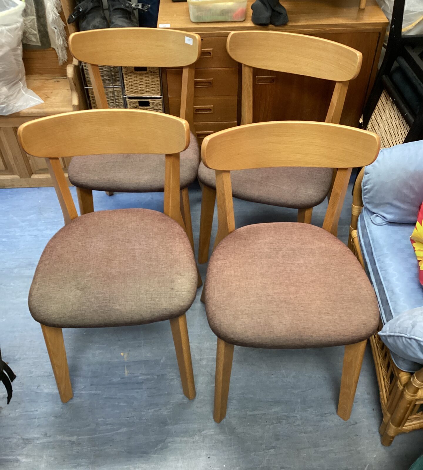 Four oak effect dining room chairs