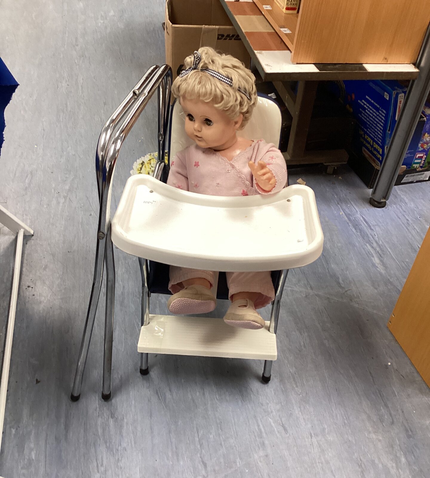 Baby doll with high chair