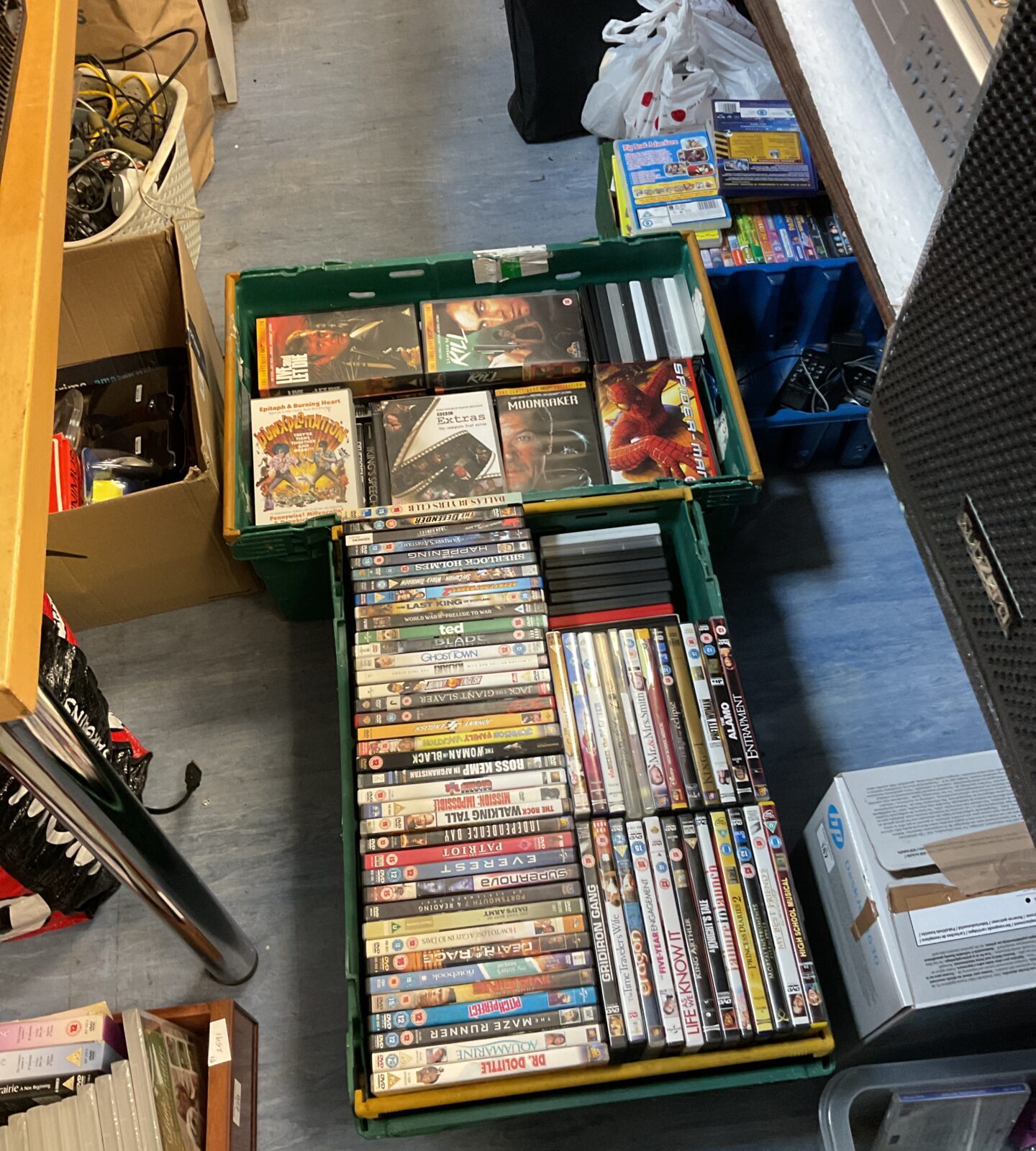 Two large trays of dvds