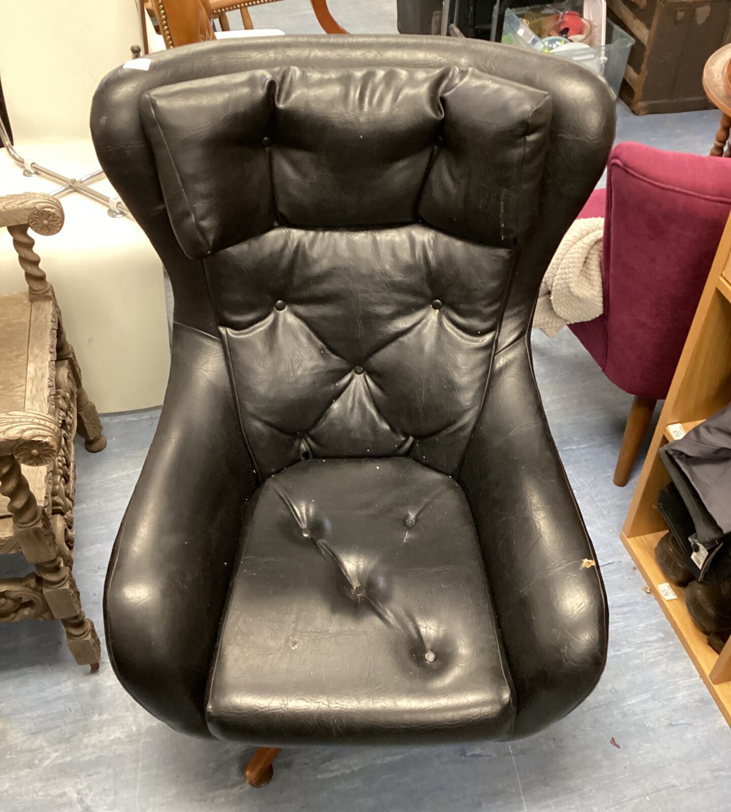 Black leather clubman chair needs attention