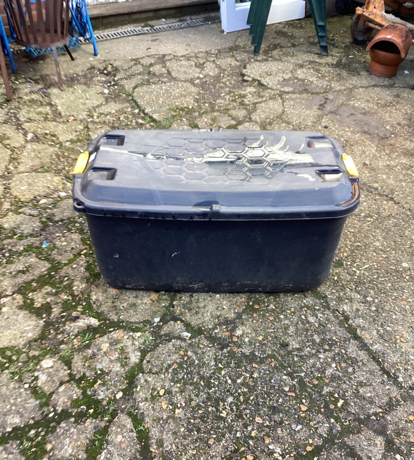 Large plastic storage box on wheels