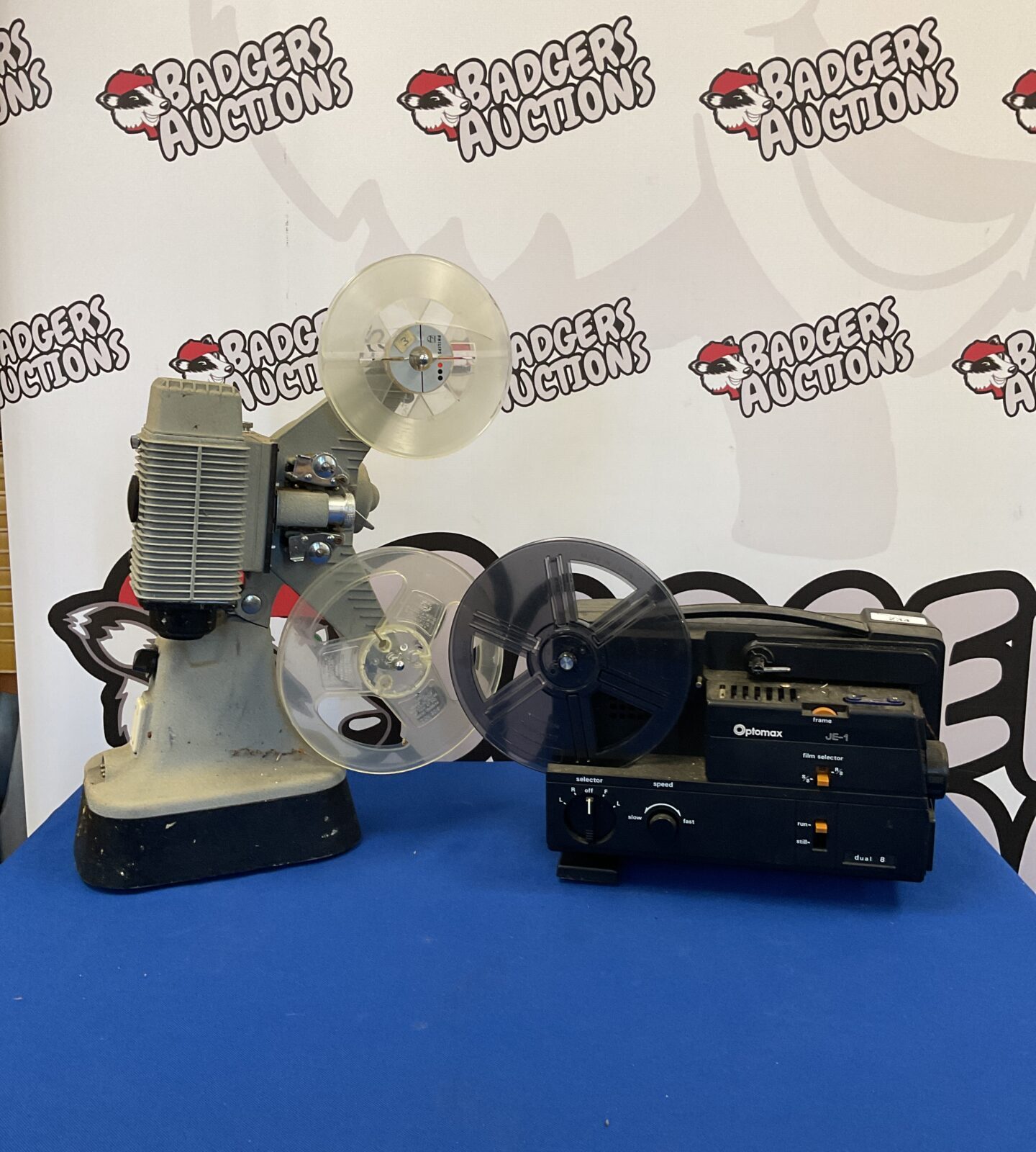 Two vintage projectors including optomax