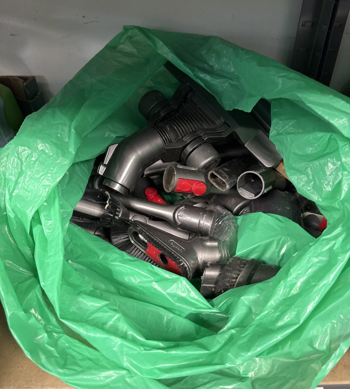 Bag of Dyson accessories