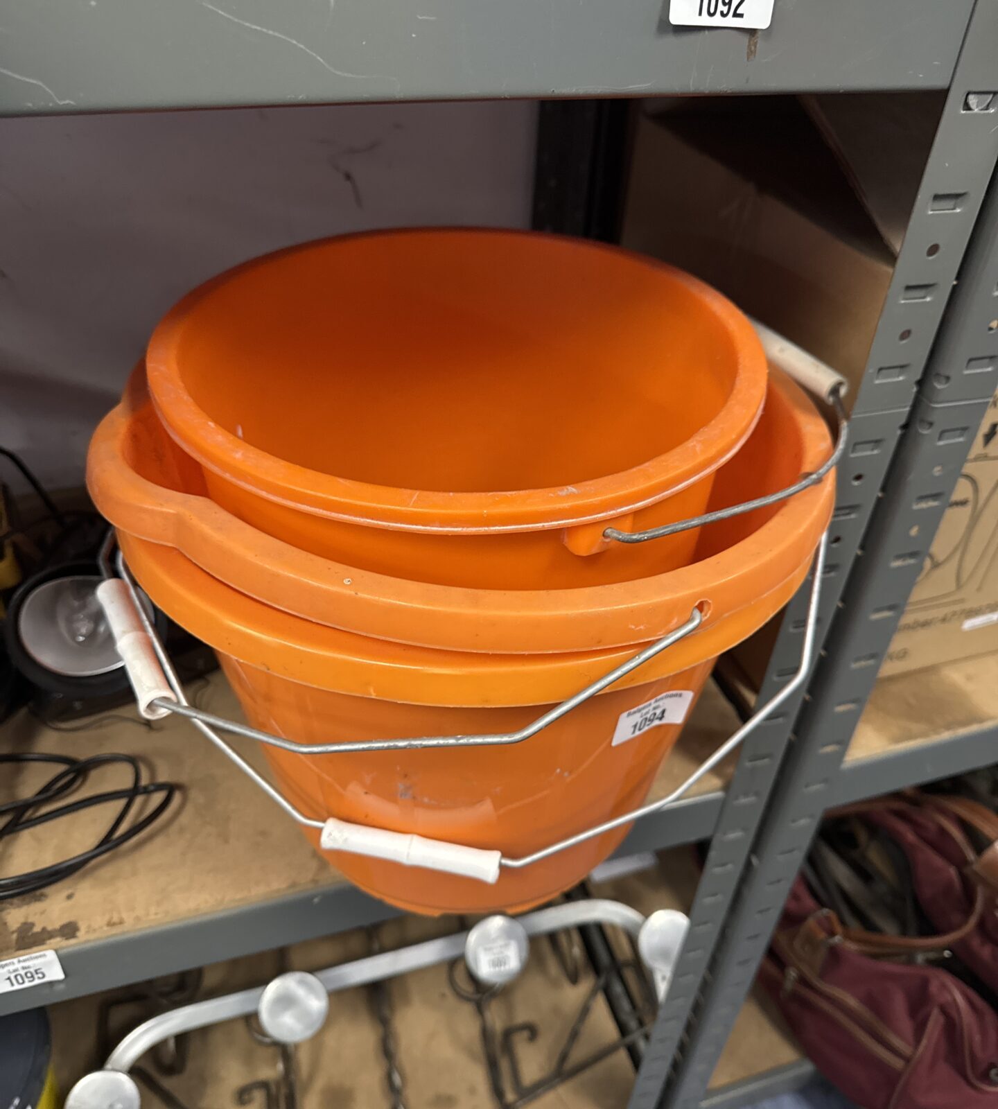 Three orange buckets