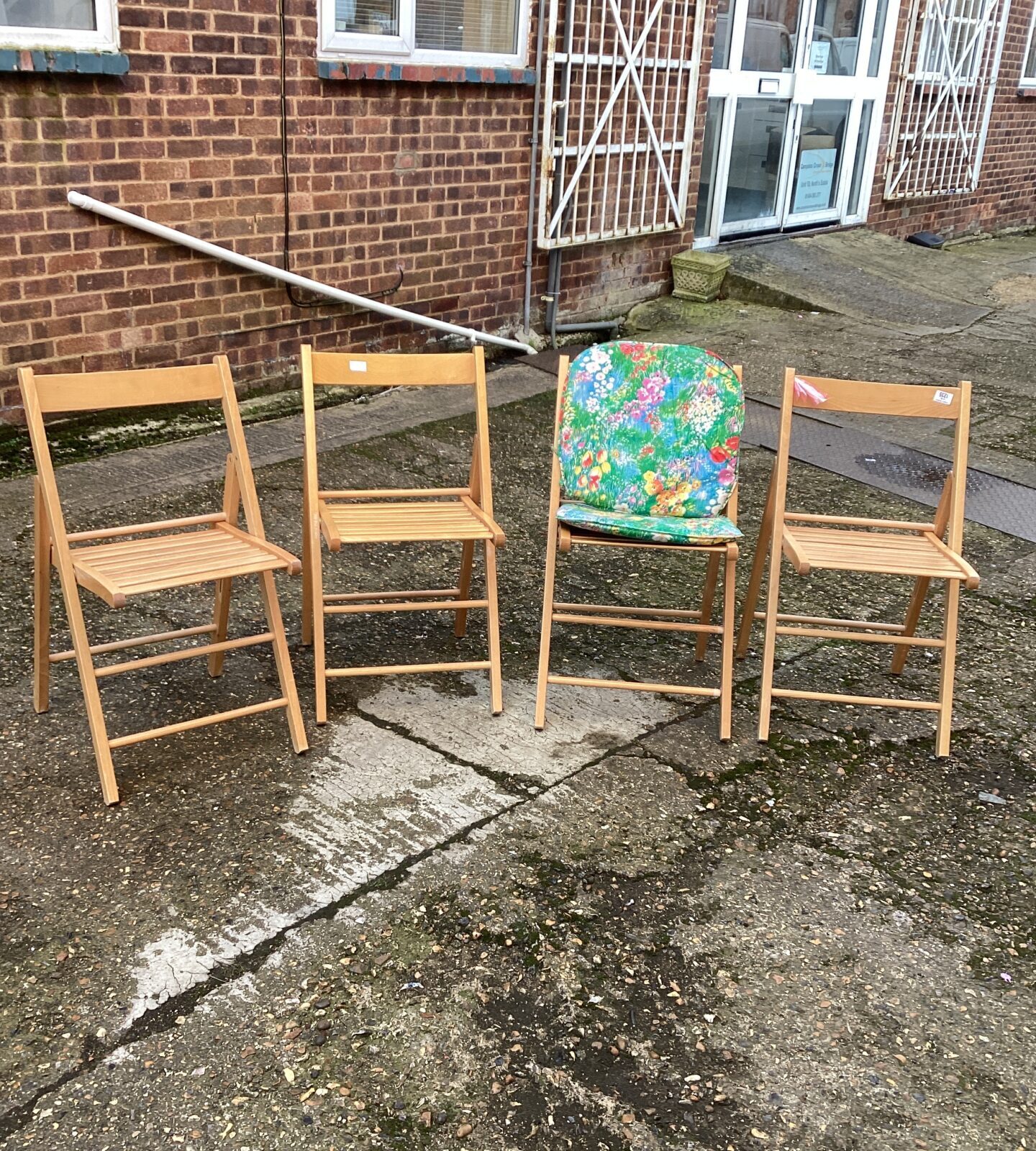 Four Folding wooden chairs