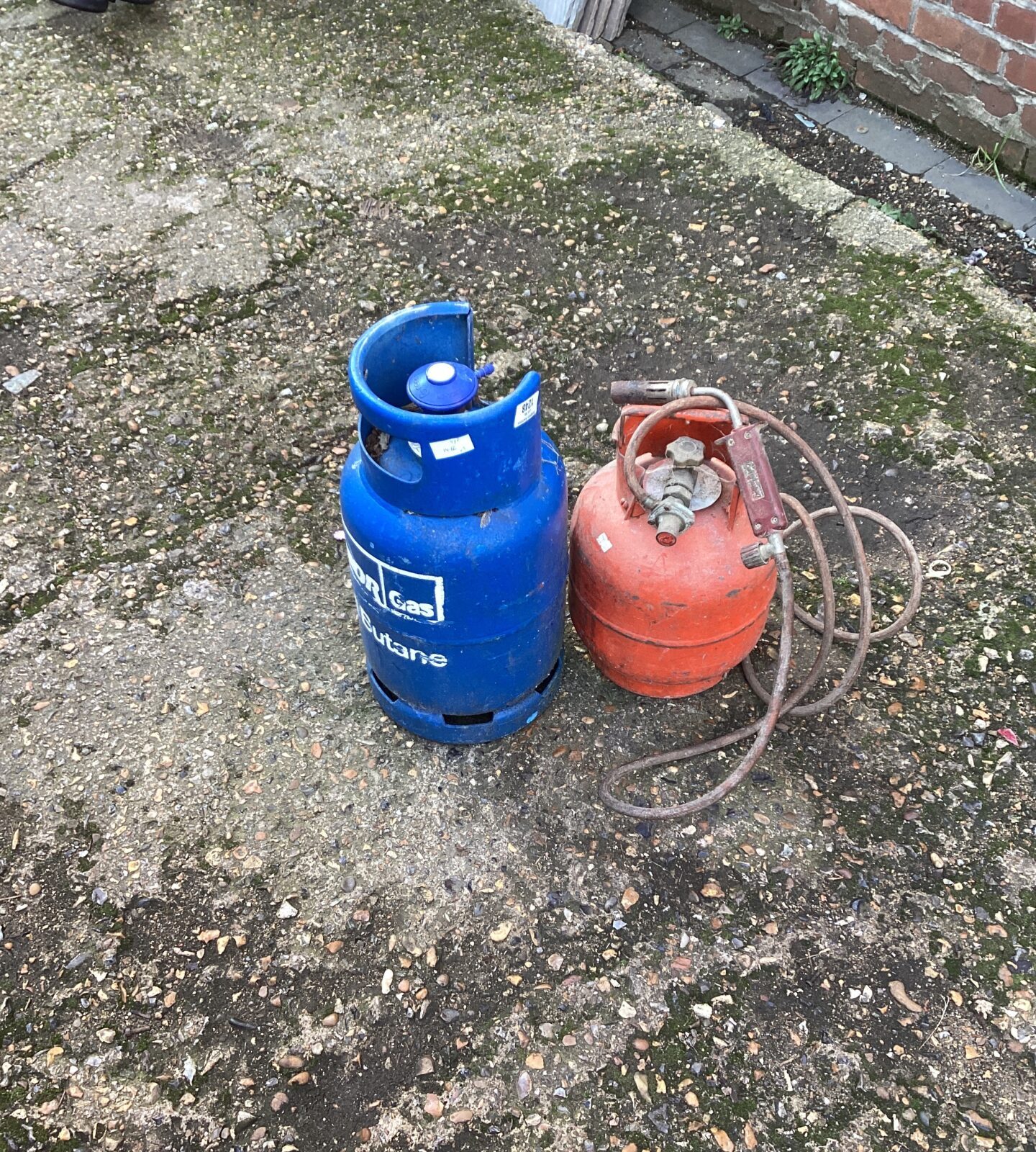 Two gas bottles and blow torch