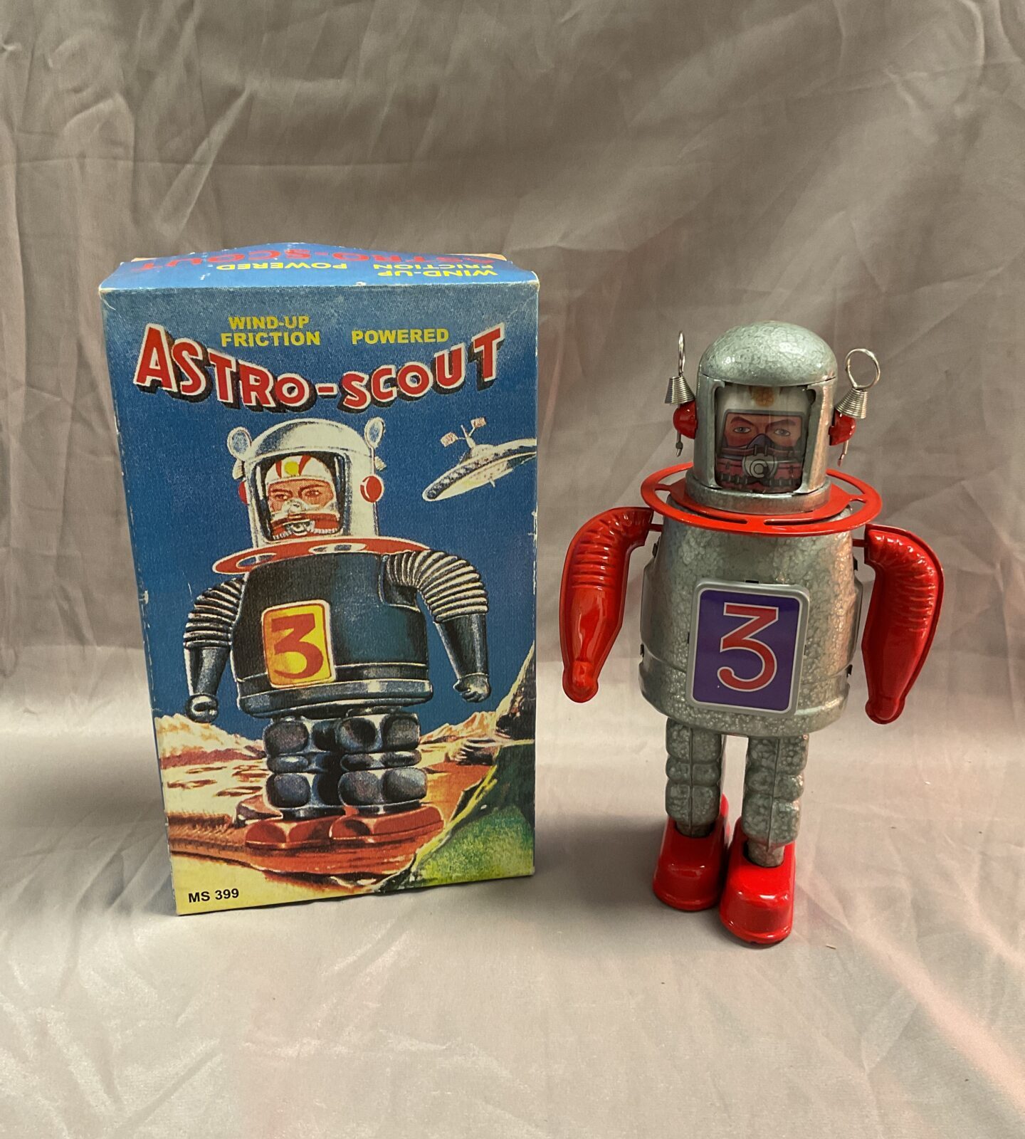 Tin plate Wind up friction powered Astro robot in original box