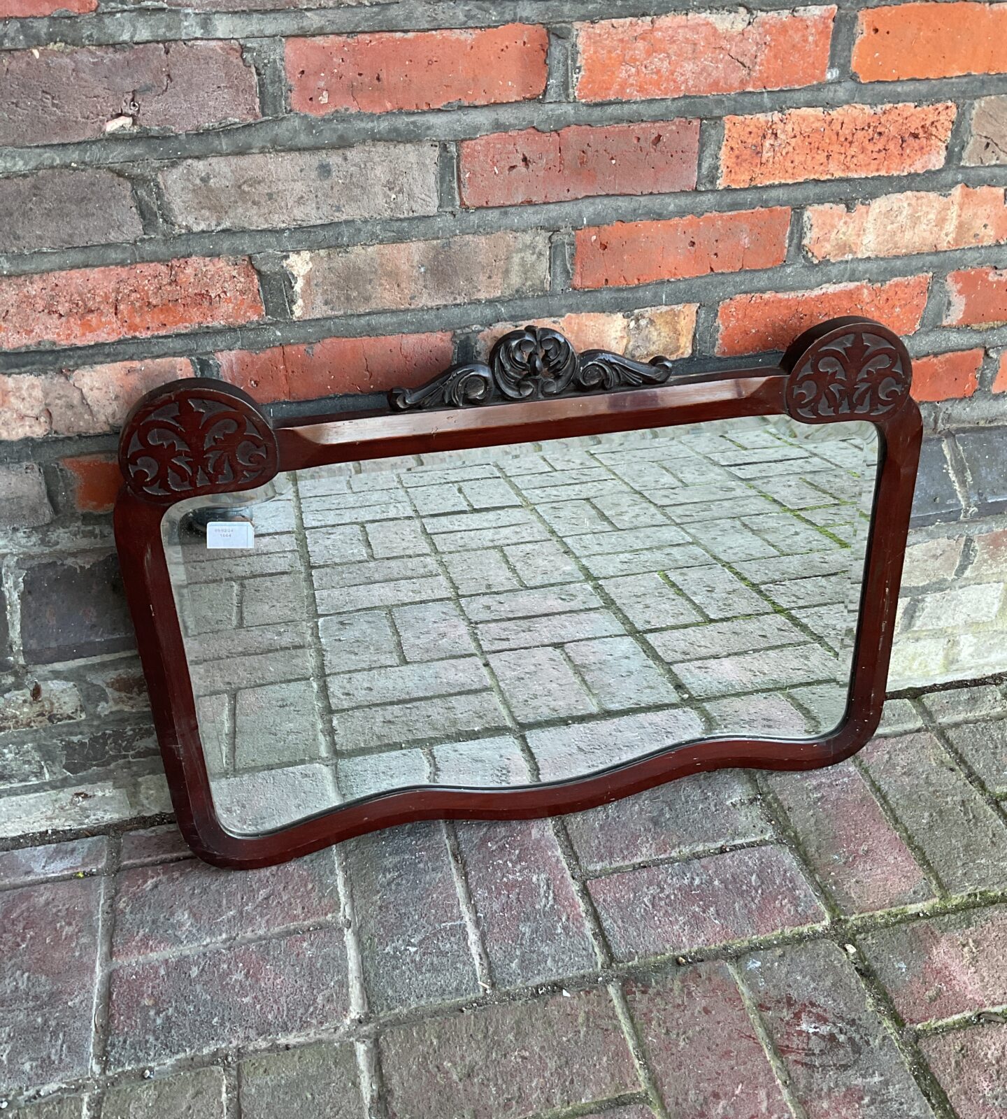 Antique mahogany bevel edged mirror